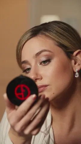 Follow along as Friend of the House @Lili Reinhart creates a bold look with the shimmery EYE TINT and iridescent LUMINOUS SILK ACQUA HIGHLIGHTER ahead of the Giorgio Armani Spring Summer 2025 show in New York.  Recreate the look by Cedric Jolivet:  COMPLEXION -LUMINOUS SILK PRIMER -LUMINOUS SILK FOUNDATION in shade 4.5 -LUMINOUS SILK CONCEALER in shade 4.5 -LUMINOUS SILK BRONZING POWDER in shade 90 -LUMINOUS SILK GLOW FUSION POWDER in shade 2 -LUMINOUS SILK CHEEK TINT in shade 50.5 -LUMINOUS SILK ACQUA HIGHLIGHTER in shade 3 EYES -EYES TO KILL CLASSICO MASCARA  -EYE TINT in shade 1, shimmer finish  LIPS -LIP POWER in shade 109 Credits: Markus Marty Makeup: Cedric Jolivet #Armanibeauty #ArmanibeautyStars #LuminousSilk #EyeTint #EyesToKill #ArmaniLipPower #LiliReinhart #Blush #LiquidBlush #MakeupLook #EveningMakeup