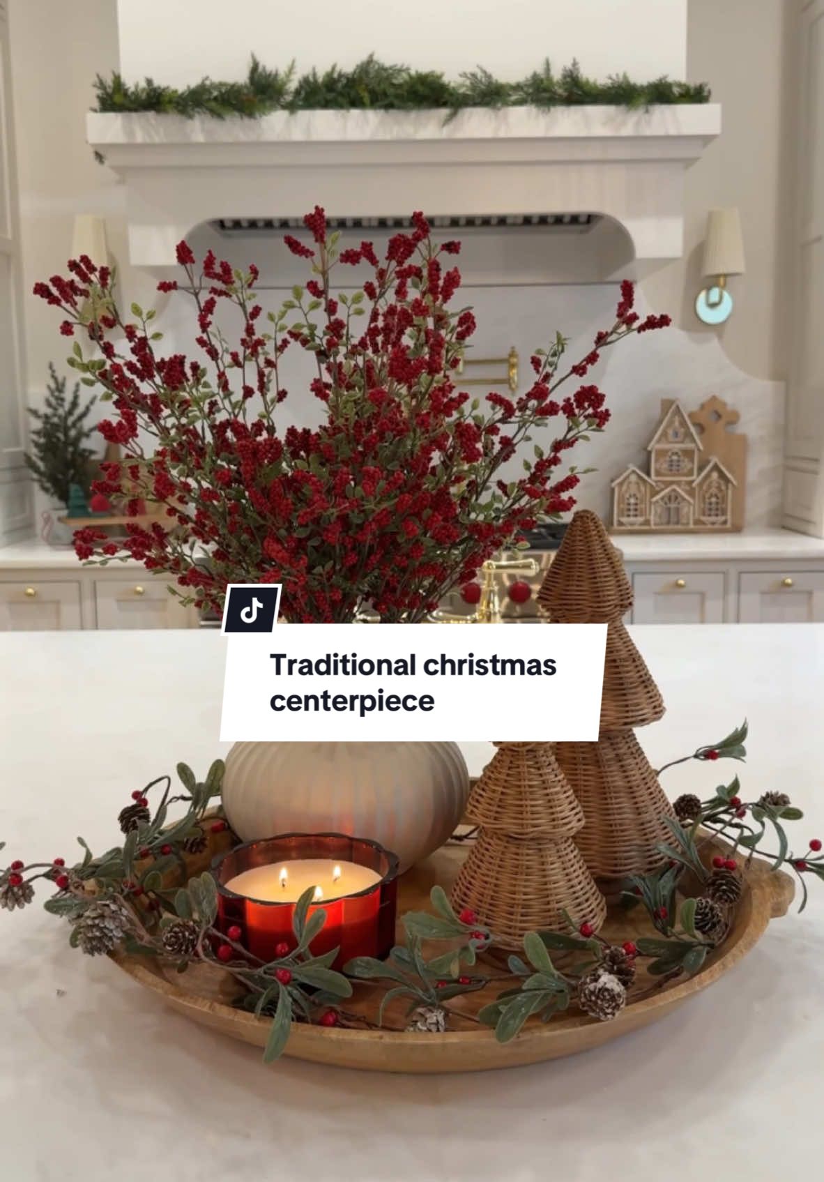 traditional Christmas centerpiece idea🎄 love how this one turned out! The red berry stems are so realistic and i love the woven trees!! Everything can be found in my LTK! #c#christmasc#christmascenterpiecec#christmashomedecorc#christmasdecorc#christmasdiyc#christmaskitchenc#christmastok