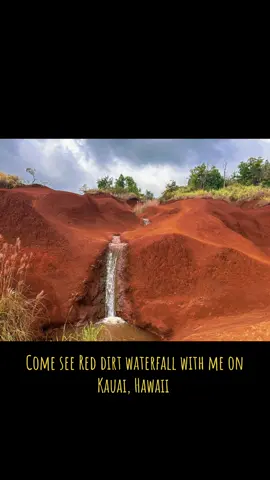 Exploring Mars? Nope, just Kauai! 🌋🌿 This hidden gem, the Red Dirt Waterfall, feels like another planet 🌎 #HawaiiVibes #KauaiAdventures #HiddenGems #WaterfallMagic #TravelGoals 