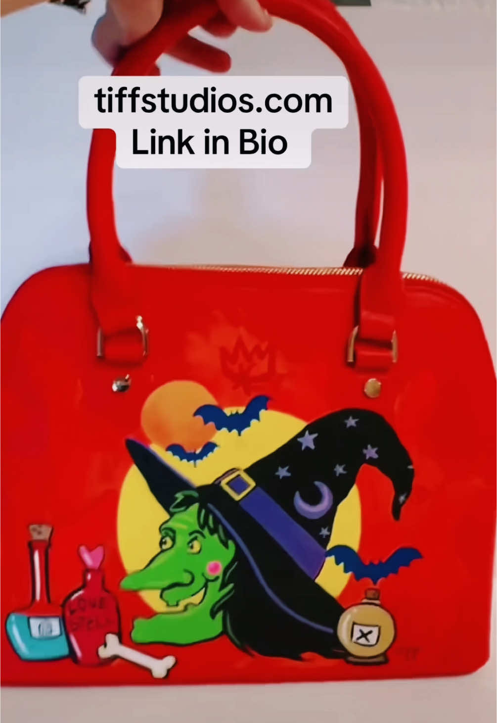 A mother-daughter collaboration of hand painted handbags! This one is adorned with a vintage witch. I love painting with my baby girl. #handpaintedfashion #handmadefashion #couture #motherdaughter 