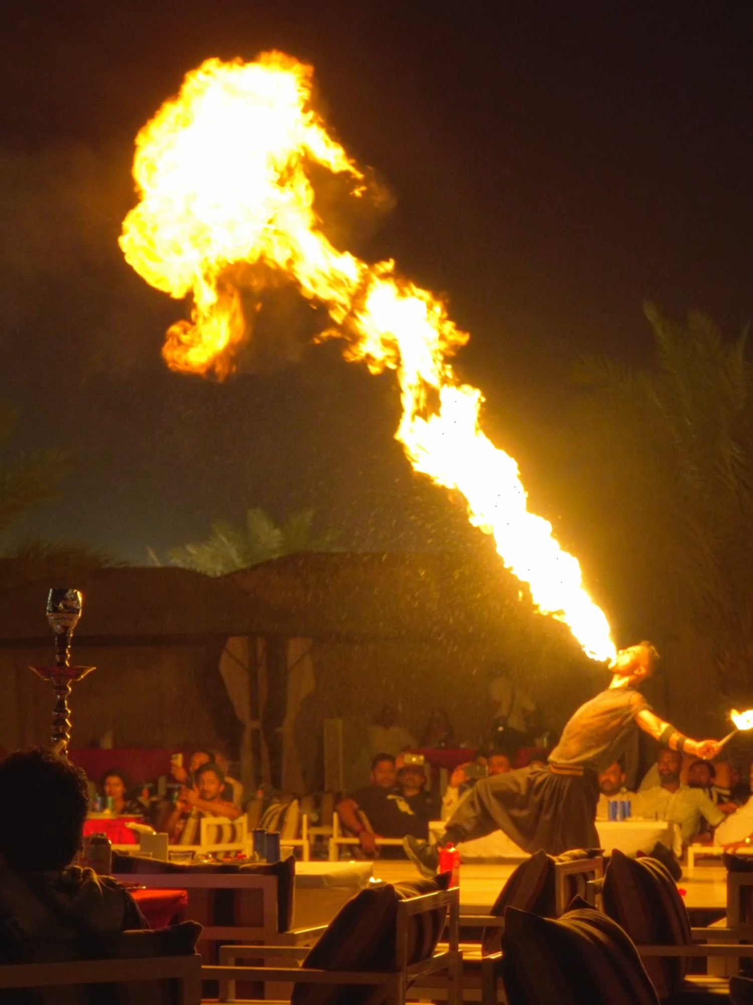 Dance like nobody’s watching, but light up the night like everyone is. #desertsafari #desertsafaridubai #firedance #fireshow