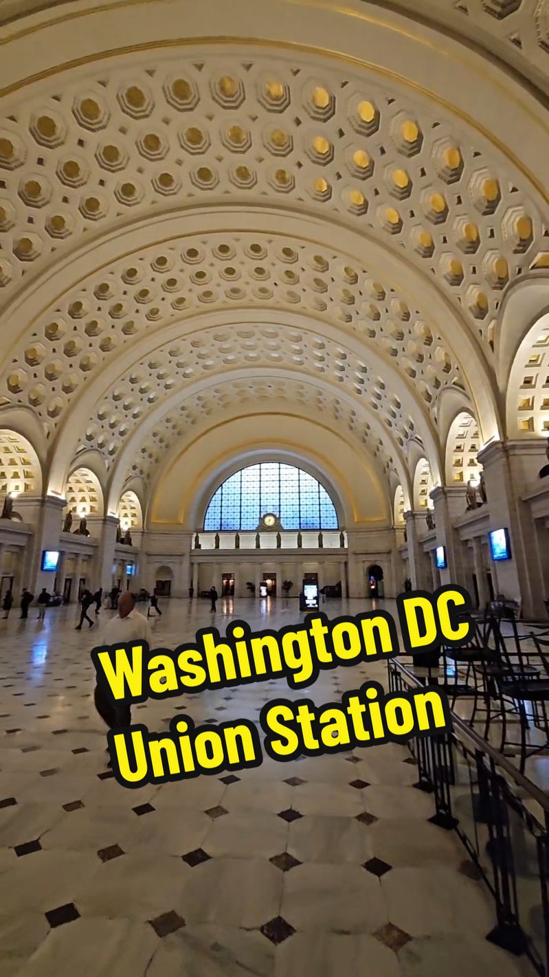 Washington Union Station, known locally as Union Station, is a major train station, transportation hub, and leisure destination in Washington, D.C. Designed by Daniel Burnham and opened in 1907, it is Amtrak's headquarters, the railroad's second-busiest station, and North America's 10th-busiest railroad station. The station is the southern terminus of the Northeast Corridor, an electrified rail line extending north through major cities including Baltimore, Philadelphia, New York City, and Boston, and the busiest passenger rail line in the nation. In 2015, it served just under five million passengers.[7] An intermodal facility, Union Station also serves MARC and VRE commuter rail services, the Washington Metro, the DC Streetcar, intercity bus lines, and local Metrobus buses. It carries the IATA airport code of ZWU.[8] At the height of its traffic, during World War II, as many as 200,000 passengers passed through the station in a single day.[9] In 1988, a headhouse wing was added and the original station renovated for use as a shopping mall. As of 2014, Union Station was one of the busiest rail facilities and shopping destinations in the United States, visited by over 40 million people a year.[10] However, the COVID-19 pandemic and other factors caused a sharp decline in retail and dining; by late 2022, more than half its commercial space was vacant,[11] but Amtrak is attempting to regain control of the station and plans a major renovation and expansion.[12][13] Source: Wikipedia  #washingtondc #amtrak #train #station #washington #union #unionstation #trainstation #hub #transit #historical #live #historic #livestream #livestreaming 