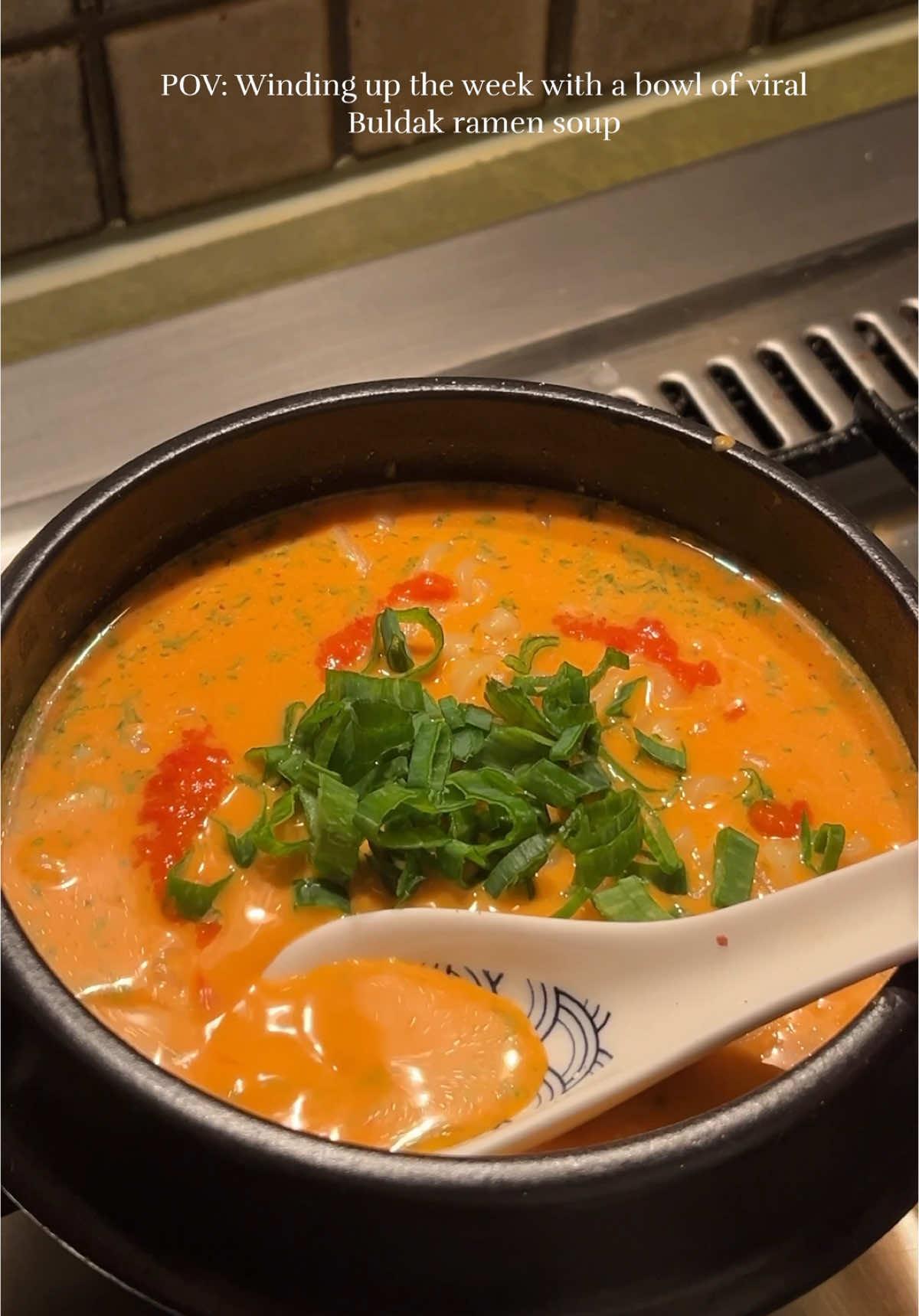 The Viral Buldak Carbonara Ramen Soup 😍 Ingredients 1 packet of Buldak ramen (noodles and seasoning packets) 1 tbsp Kewpie mayo (or regular mayo) Cheese powder and Buldak sauce (from the ramen packet) 1 tsp harissa Salt, to taste Ramen cooking water, as desired Toppings: chopped scallions fresh lime Boil the ramen noodles in water for 2-3 minutes In a bowl, mix the Kewpie or regular mayo with the ramen seasoning packets, cheese powder, Buldak sauce, harissa, and salt. Stir until well combined. Add some ramen cooking water to reach your desired soup consistency, then stir until smooth and creamy. Now Add the cooked noodles to the bowl and mix well!  Top with chopped scallions or green onion and squeeze fresh lime juice over the soup. . . . . . . . . . . . . #ramen #instantramen #ramenpink #pinkramen #buldak #buldakramen #tteokbokki #rabbokicooking #latenightramen #latenightcravings #samyangramen #asmrfood #gochujangsauce #harissa #theviralbuldaksoup #buldaksoup 