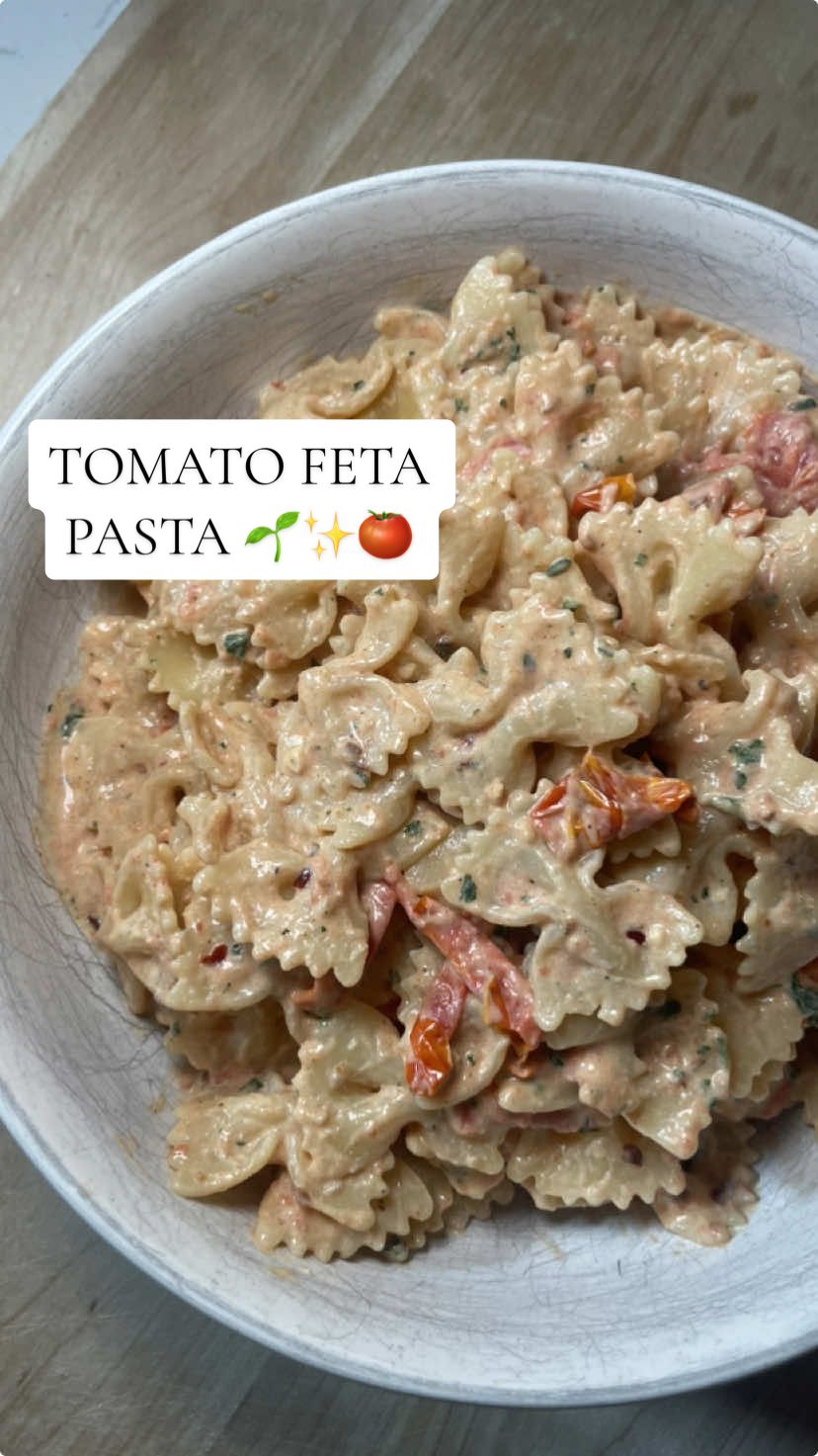 tomato feta pasta 🌱✨🍅recipe below!!  Ingredients: @Drink Poppi for the good vibes 1 container tomatoes 1/4-1/2 cup @athenosfeta feta  @Bono Extra Virgin Olive Oil olive oil 1 cup @Good Culture cottage cheese 1 garlic clove About 1 cup @Kettle & Fire chicken broth  Pasta of choice  Basil 2 chicken breasts  Seasonings: italian seasoning, onion powder, salt, pepper, red pepper flakes, @Primal Kitchen Foods Foods avocado oil Instructions: 1. In a pan (@Caraway Home ELLIETEALE10 for 10% off), add in tomatoes, feta, olive oil, and seasonings minus avocado oil, and bake at 425° for 25 minutes 2. In a blender (@nutribullet ), combine cottage cheese, garlic, and chicken broth and blend until smooth 3. Once tomatoes and feta are cooked, smash woth a spoon, then add in cottage cheese mixture and stir until well combined 4. Cook pasta according to package, then coat with tomato feta sauce 5. In a pan (@Lodge Cast Iron ), heat avocado oil, then add in seasoned chicken breat and brown on both sides, then finish cooking in oven at 425° 6. Assemble and top pasta with basil  7. Enjoy😚 #mealideas #dinneridea #easymeal #easydinner #healthymeals #EasyRecipe  
