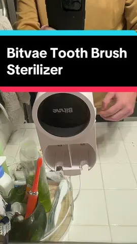 Your toothbrush is dirtier than you think. This futuristic toothbrush sterlizer takes away bacteria and keeps your toothbrush fresh. #toothbrushsterilizer #toothbrushtech #bathroomessentials #toothbrushsterilizeruvlight #toothbrushcare #giftideasforher #giftideasforhim #blackfridaydeals #tiktokmademebuyit #holidayshopping 