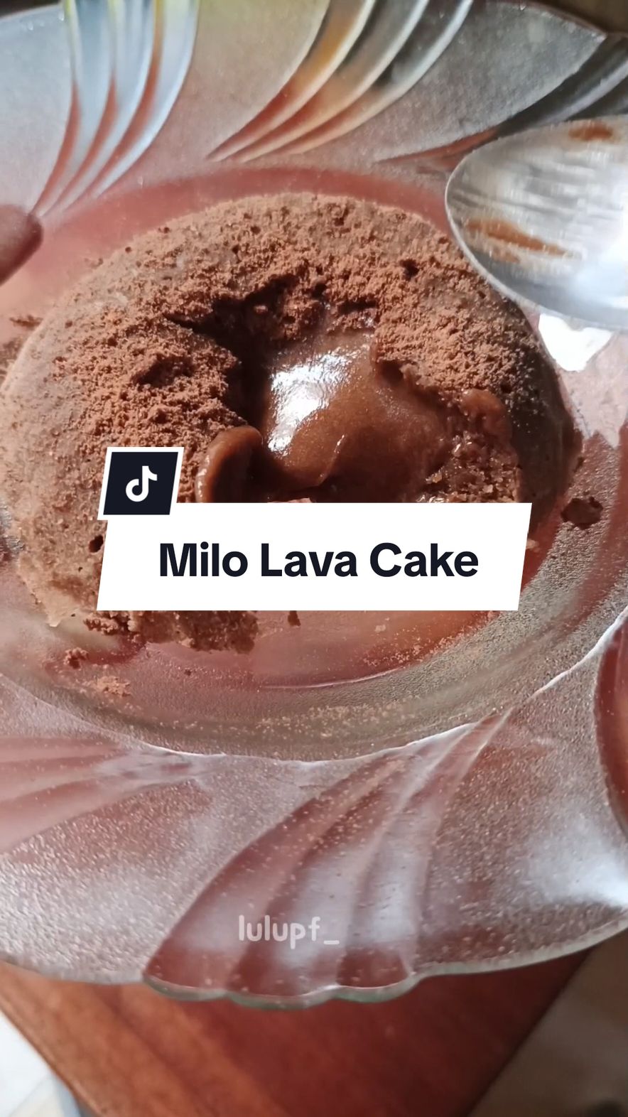 NO OVEN NO MIXER pertama bikin oke laah wkwk😅 Resep Milo Lava Cake 2 pcs milo 3 sdm margarin 1 sdm air panas 2 sdm gula 1 btr telur 3 sdm tepung terigu Cara memasak: 1. Tuangkan milo 2 pcs ke dlm wadah, campur kan dg 1sdm air panas aduk hingga rata.  2. Masukan telur&gula di wadah lain diaduk sapai rata, masukan 3sdm tepung terigu dan aduk rata.  3. Masukan 3sdm margarin yg cair td ke adonan tepung dan campurkan adonan milo nya diaduk sampai rata.  4. Tuang ke dlm wadah yg sudah diolesi margarin dan tepung, kemudian kukus slma 8 menit.  5. Angkat & ready to eat Siap santapp!  #fyp #milolavacake 