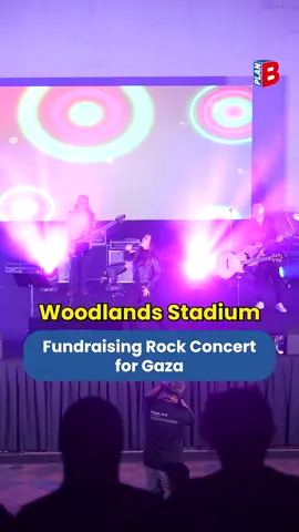 The ‘Rock Untuk Rakyat’ concert, a collaboration between Woodlands Grassroots Organisations and the Rahmatan Lil Alamin Foundation (RLAF) raised over S$171,565.92 for humanitarian aid in Gaza, surpassing its S$150,000 target. Held at the Woodlands Stadium on October 25, more than 700 attended the event. The concert also aimed to empower talented individuals, including former offenders, by providing a platform for them to showcase their skills. Member of Parliament Mariam Jaafar attended to support the cause, emphasizing the concert’s added charitable aspect as a meaningful way to address public concerns for Gaza.