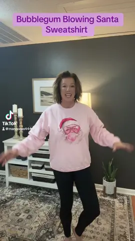 Bubblegum blowing Santa sweatshirt. Grab yours early.#christmas #christmasgiftideas #giftideas #santaclaus #christmassweatshirt 