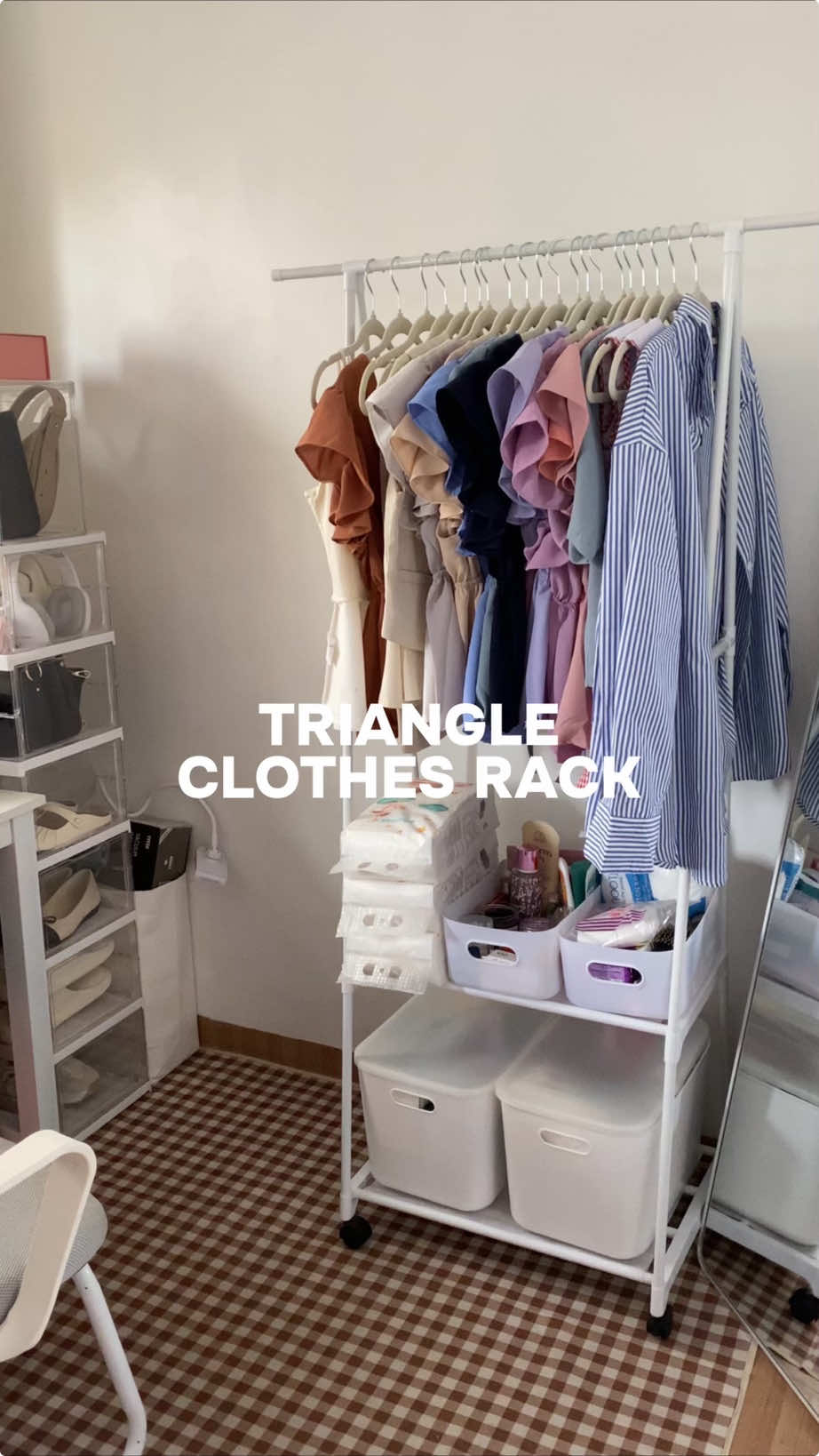 Replying to @@ Sam Finds ph Space saving triangle clothes rack perfect for small room  #rack #clothesrack #coatrack #hangerrack #clothingrack #roomessentials #clothinghacks #multilayer 