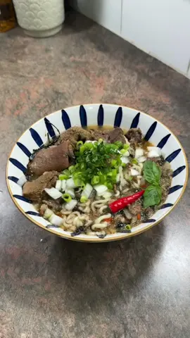 Goat-Beef Pepper Soup Ramen 🍜 🇳🇬 🇯🇵. This isn’t a super rare fusion dish but I wish it was more common. It’s an amazing combination. I recoomend pepper-soup with noodles ten times over pepper-soup with rice.  Before I give you the ingredients let me just share an interesting point that Igbo (my native language from Nigeria) and Japanese do share few coincidental similarities, like names. My Name Izunna is also in Japanese Izuna which was in Naruto, ‘Izuna Uchicha’. Other Igbo names like Azuka, Mabuchi, Maduka etc apart from Igbo other Nigerian languages have similar names in Japanese; Osaka, Okada and name like Osazuki can sound Japanese but also Edo, you get? Okay I just thought you’d find that fascinating. Here are the ingredients I used: Goat Meat Beef +bones Maggi Salt Onions Scotch bonnet or Habanero Crayfish or shrimp powder Celery Scent leaf or Thai Basil Pepper Soup spice Black pepper Noodles Spring Onions I cooked the meat for a total of 3hrs. 2hrs before spices, 1hr while I added spices and condiments. If you have a pressure cooker you can cook it in half that time or less.  #nigerianjapanese #ramen #peppersouprecipe #peppersoupramennoodles #fypシ #nigeriantiktok🇳🇬 #fyp #nigeriansincanada #recipesoftiktok #nigeriansindiaspora #foodtiktok 