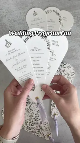 Amanda and Jason’s dreamy fan-style wedding program features custom hand-drawn watercolor florals in soft blue and lavender. Tied together with elegant linen ribbon, it beautifully details the ceremony, wedding party, and order of events for a perfect celebration. . #weddingstationery #luxurystationery #stationery #weddingdetails #weddingprogram #programfan #weddingfan