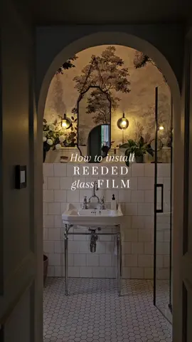 How to install REEDED glass film...  Mine is from Abode Window films 🪟 It cost me just over £30 and I had enough for my window & cabinet with a little left over.  My best advice is make sure your glass is SUPER CLEAN✨  You'll only get air bubbles if there's something underneath the film🫧  Mix washing up liquid with water in a spray bottle, get a sharp blade and something to guide it with then just follow the instructions 👌🏼  I'm SO impressed with the results! Such a great way to upgrade plain glass and add privacy too 😍🪟🚿🛁🧖🏼‍♀️ #windowfilm #privacyfilm #sashwindow #bathroomdecor #stylingideas #ensuite #victorianhome 