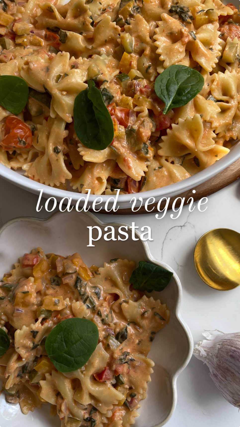 Day 15: Loaded Vegetable Pasta 🫑🍅 This veggie-packed pasta is rich, creamy, and absolutely bursting with flavour! With roasted capsicum, zucchini, cherry tomatoes, and spinach, this dish is an easy yet indulgent way to sneak in extra veggies. Just top it with a little parmesan for the ultimate savoury kick. Thank you yo @Carleigh Bodrug - plantyou for this delicious recipe. Ingredients - ½ red capsicum, chopped - ½ yellow capsicum, chopped - ½ zucchini, sliced - 125g cherry tomatoes - ½ red onion, sliced - 1 cup spinach - 2 tbsp cream cheese - 1 head of garlic, sliced in half - 1 tsp fresh thyme (or ½ tsp dried thyme) - 2 tbsp olive oil - Salt and pepper, to taste - 1 tbsp tomato paste - Pasta of your choice, cooked (around 200g dried) - Grated parmesan, for topping Instructions 1. Prep and Roast the Veggies: Preheat your oven to 200°C (fan-forced). In a large baking dish, toss the red and yellow capsicum, zucchini, cherry tomatoes, red onion, and spinach with olive oil, salt, and pepper. Add the thyme, then nestle the garlic halves cut-side down among the veggies. 2. Add Creaminess: Dot the veggies with the cream cheese and tomato paste. Cover the dish tightly with foil. 3.  Roast: Place the dish in the oven and roast for 50 minutes, until the veggies are soft and full of flavour. 4. Combine with Pasta: Once done, remove the garlic and squeeze the soft cloves back into the veggies, discarding the skin. Stir well, then add your cooked pasta, tossing everything together until the pasta is well coated with the creamy veggie mixture. 5. Serve: Serve the pasta warm, topped generously with grated parmesan. Enjoy! #Recipe  #plantbased #vegetari#vegetarianfoodcipe #healthy #healthyfood #EasyRecipe #vegetarian #creamypasta #pasta 