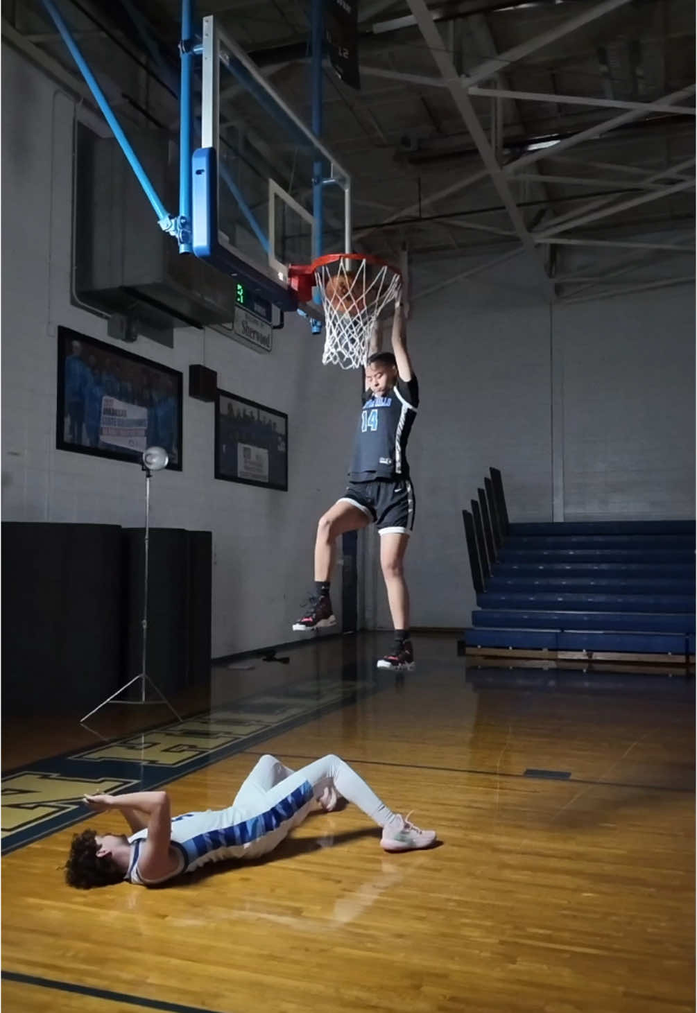 With the dunk!  Sylvan Hills Basketball media day 