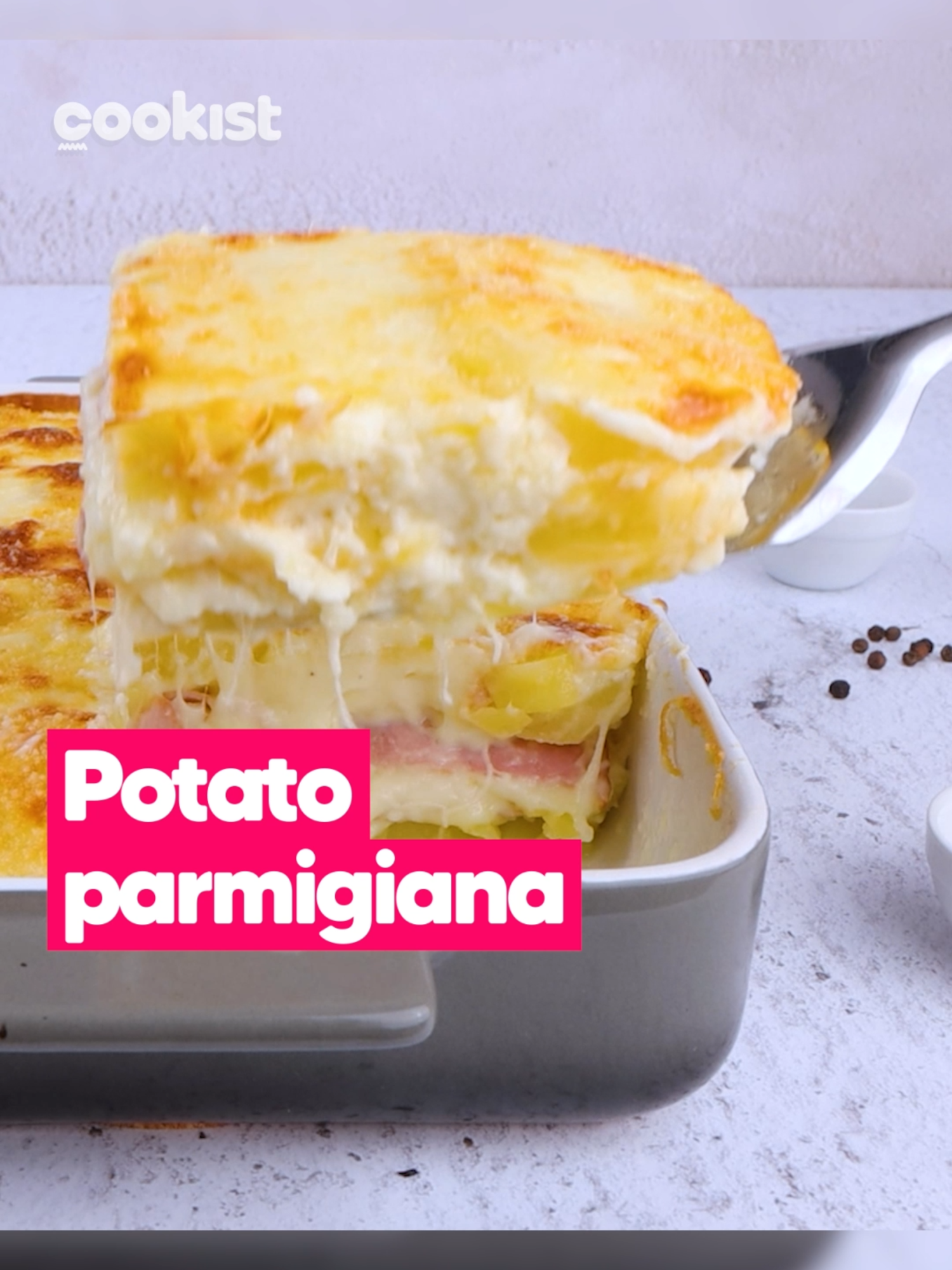 Layer the potatoes, ham, cheese, and bechamel and cook until golden 😍 This is the cheesiest casserole you'll ever taste 🤤❤️ Full recipe: 👉INGREDIENTS 1.1kg of potatoes Extra virgin olive oil 650ml of béchamel 270g of cheese 160g of cooked ham Parmesan 👉METHOD 1. Peel the potatoes and transfer them to the pot with the water. Boil for 15 minutes and remove from the heat. 2. Let the potatoes cool and cut them into slices about half a centimeter thick. 3. Pour extra virgin olive oil into the baking dish and add the béchamel sauce at the bottom. 4. Make a first layer with the potatoes, covering the entire surface of the baking dish. Then add the cheese, cooked ham, and a little béchamel sauce. 5. Arrange another layer of potatoes, then add the cheese. Add the cooked ham and the béchamel again. 6. Arrange the final layer of potatoes and cover with béchamel sauce. Sprinkle with parmesan and drizzle with olive oil. 7. Transfer to the oven and bake at 180°C/360°F for 30 minutes. 8. After baking cut a slice of potato parmigiana and serve. Isn't it delicious?  🤤  #cookistwow #cookistrecipes #easyrecipes #yummy #potatoes #parmigiana #baking #cooking #foodlover #foodtok