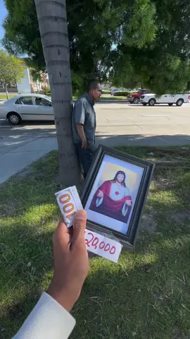 offering photo of Jesus or $1000 cash to strangers
