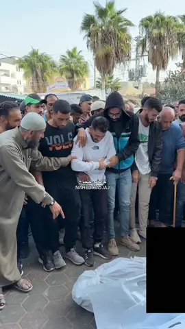 Palestinian youth cries during a farewell prayer for his mother, who died last night in the Nuseyrat camp bombing #newspalestine 