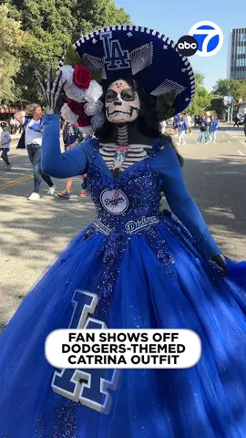 A fan dressed as a #Dodgers-themed La #Calavera #Catrina attended the team's #parade Friday morning in downtown Los Angeles, among thousands who turned out to help the Boys in Blue celebrate their #WorldSeries championship. 💙💀 The skeletal Catrina is one of the #DíadeMuertos holiday's most iconic characters.