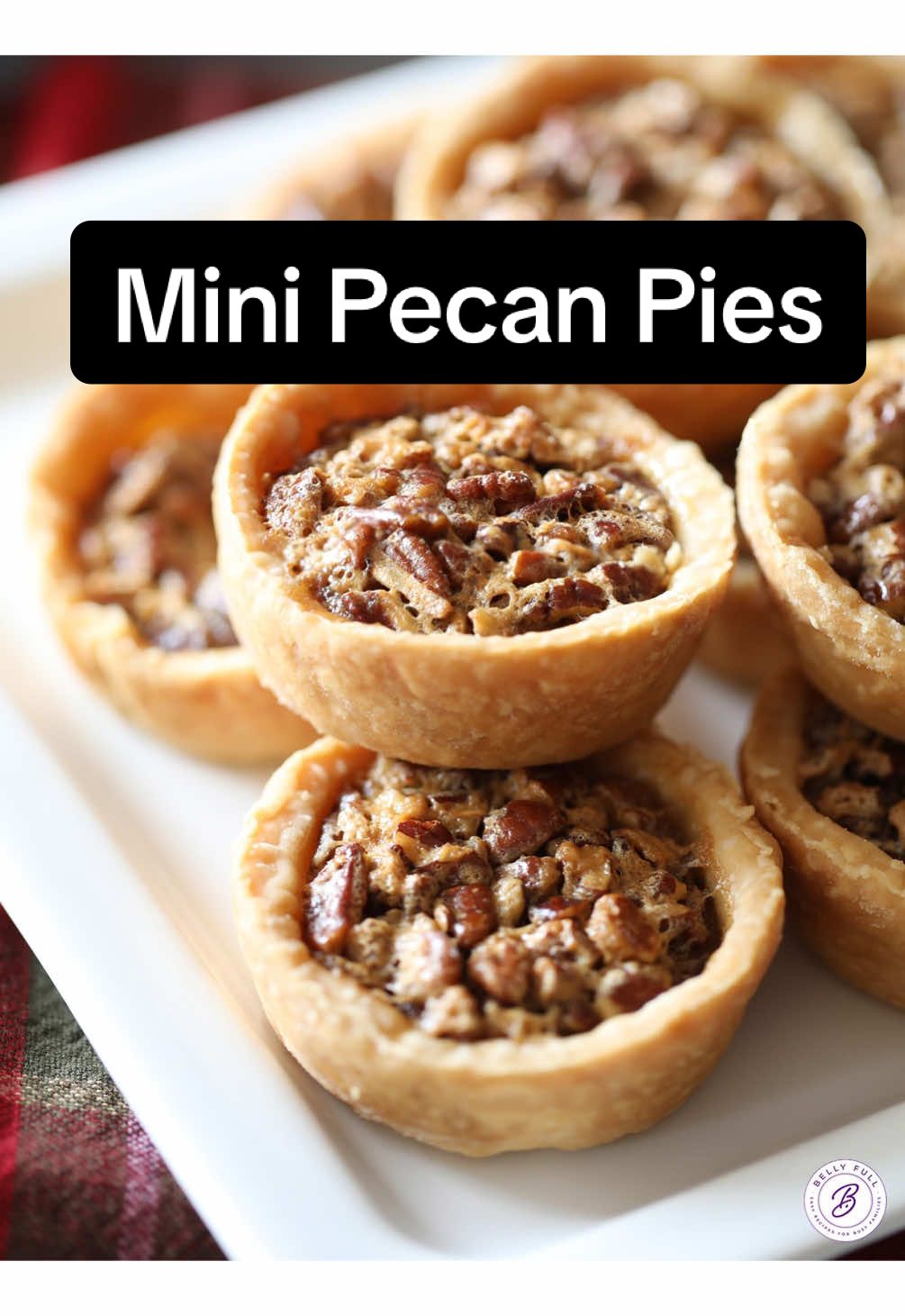 These Mini Pecan Pies have all the flavors of traditional pecan pie, but in mini form and individual servings. Super easy and great for holiday entertaining! #pecanpie #minipecanpies #holidaydessert #EasyRecipes 