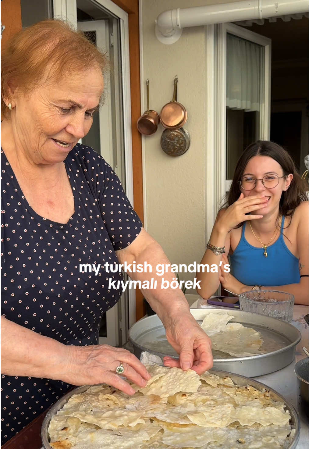 My grandmother really enjoys sharing her recipes with you and being featured in my videos. She doesn’t use social media herself, but her sister always shows her my videos, so she also gets to hear your lovely comments🥰 This summer, we filmed a few of her famous recipes. Last month, I shared her dessert recipe—maybe you remember it. Her most popular pastry is actually peynirli su böreği, but since that one takes more work, I thought we’d start with this easier kıymalı börek (minced meat börek) first ☺️ The baked yufka (phyllo dough) used here are made by my grandmother’s sister. My grandma requests that they’re made with milk, which she says makes them taste even better. But you can use store-bought yufka.  She melts a generous amount of butter, coats the baking tray, then wets the yufka in water, breaks them into pieces, and arranges them in layers on the tray. My grandmother prepared the minced meat filling the day before, slowly cooking the onions until they almost melt, then adding ground beef, salt, black pepper, and red pepper flakes to taste. She spreads this mixture evenly over yufka and continues layering more yufka on top. She drizzles the remaining butter on top and bakes it in a preheated oven at 190°C (375°F) until the pastry is golden brown and crispy. The pastry is soo crunchy, but don’t let it look too dry—the amount of butter makes it impossible for it to be dry! 😂 I hope you enjoyed our grandmother-style minced meat börek 🥰 We also filmed her etli pilav (which she calls tas kebabı)—my personal favorite—, and my dad’s favorite, her kuru fasulye (bean stew) recipe. I’ll be sharing those in the coming weeks ✨ And let me know if you’d like us to film her su böreği too😊 • #foodieedaRecipe #grandma #grandmasrecipes #Recipe #recipebook #borek #borekrecipe #pastry #breakfast #grandmacooking #grandmacore #grandmother #homemade #turkishfood #turkishfoods #turkishcuisine #turkishborek #turkishcooking 