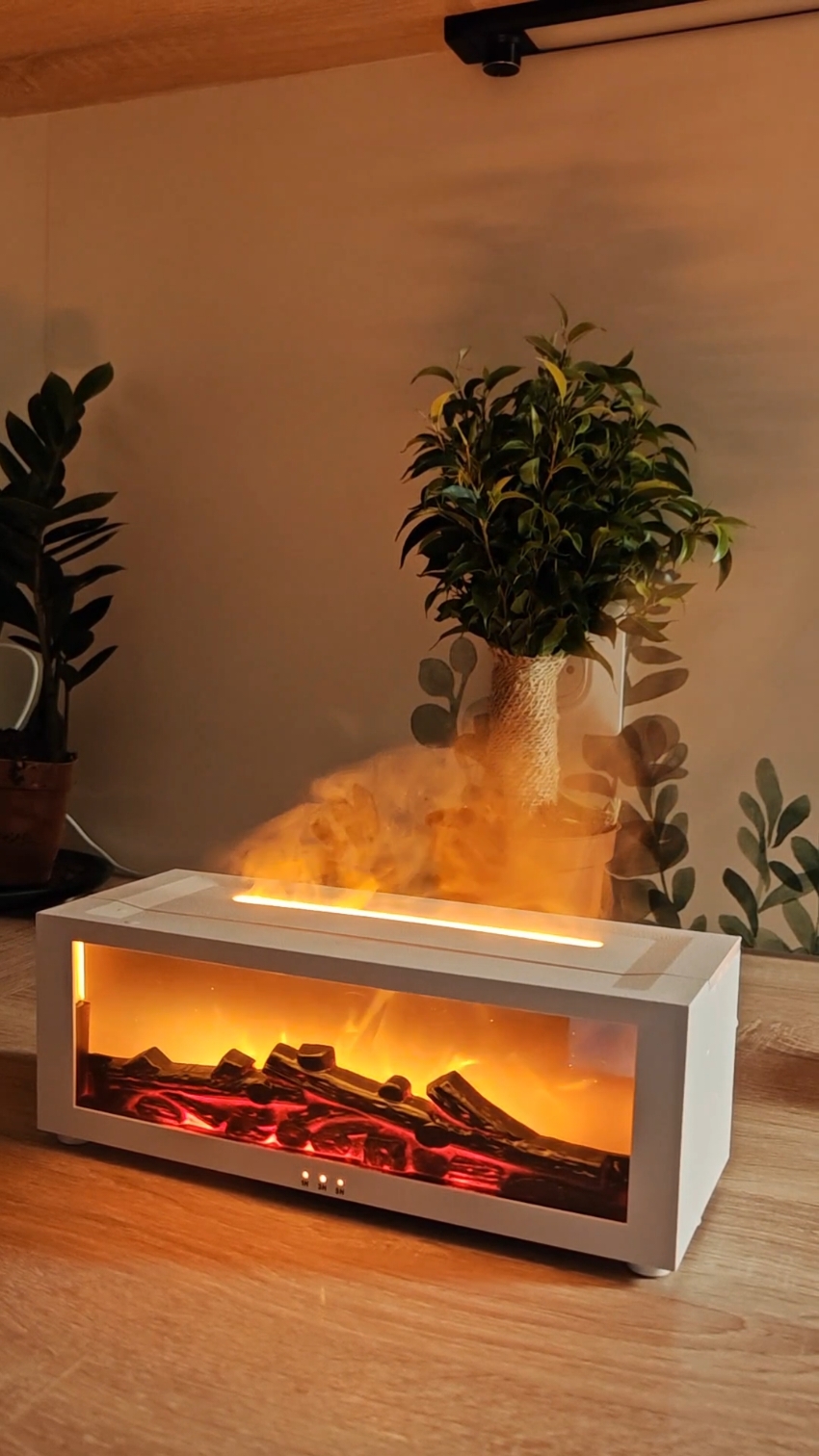 Create a cozy ambiance in seconds with our LED Fireplace Humidifier! Perfect for relaxation and adding warmth to any space. Discover the magic of flame and mist combined.  #HomeEssentials #LEDHumidifier #FireplaceEffect #CozyHome #RelaxingVibes #Aromatherapy #HomeDecor #Ambiance #LEDflame #Humidifier #CalmingAtmosphere #giftideas 