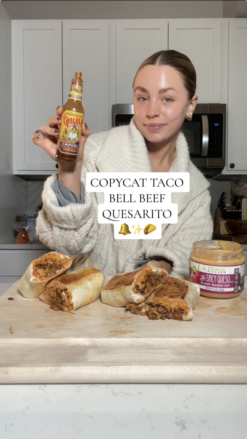 Replying to @_jolynn_m copycat taco bell beef quesarito 🔔✨🌮 recipe below!!! Ingredients: @Drink Poppi for the good vibes @Mission Foods  @Primal Kitchen Foods spicy queso @NearEastProducts spanish rice 1 lb @ThomasFarmsUSA ground beef 1 packet @Siete Foods spicy taco seasoning 1/2 diced red onion @Cholula Hot Sauce chipotle sauce @FAGE greek yogurt Instructions: 1. In a pan (@Lodge Cast Iron ), saute red onion and beef, then add in taco seasoning as directed 2. Prepare spanish rice as directed 3. Assemble beef burrito, starting with queso, rice, beef, yogurt, then chipotle 4. Roll beef burrito 5. Brown beef burrito on both sides 6. Serve with additional queso amd chipotle sauce  7. Enjoy😚 #DinnerIdeas #easydinner #healthydinnerideas #easydinnerrecipes #healthyrecipes #copycat #tacobell 