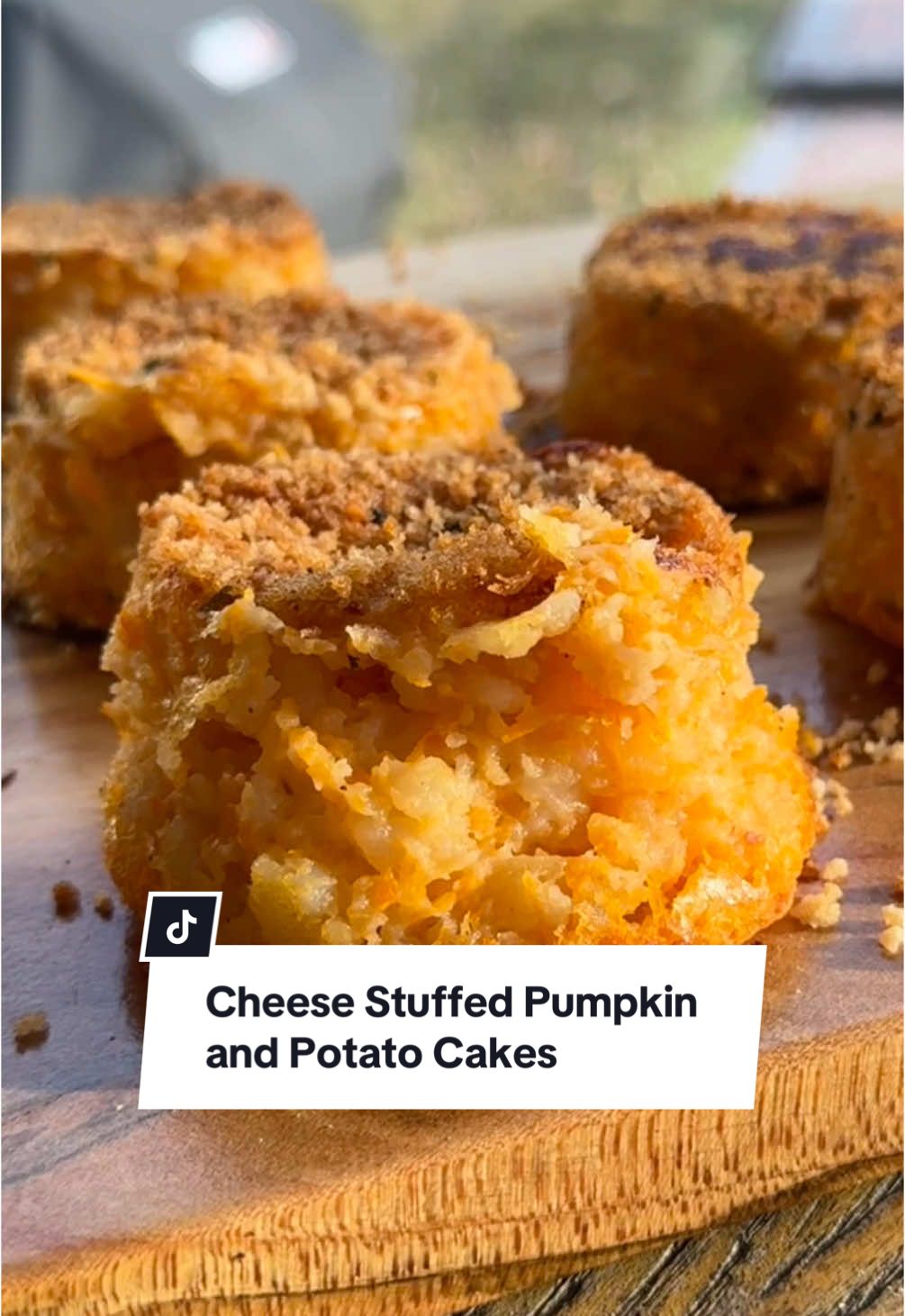 EP 2 of my Halloween Series 🎃 | Pumpkin & Potato Cheese-Stuffed Mini Cakes for Lunch!  I’m celebrating with a cozy autumn lunch: savory pumpkin and potato cakes stuffed with melty cheese! 🧡 These little bites are warm, cheesy, and perfect for fall. You can make these with any cheese you like—or even try a meaty filling! This is my seasonal take, and they came out delicious. Plus, they’re so customizable; switch up the veggies or cheese for endless combos! 🍂 Recipe below: Ingredients: 	•	4 small potatoes, peeled 	•	1/2 cup pumpkin purée 	•	1/3 cup half-and-half 	•	Salt & pepper to taste 	•	1/3 cup grated pecorino Romano cheese 	•	Breadcrumbs for coating 	•	6 oz cheddar cheese (or cheese of choice), cut into small cubes Instructions: Start by boiling the potatoes until they’re fork-tender, then mash them with a fork. Add the pumpkin purée, half-and-half, and grated pecorino to the potatoes. Season with salt and pepper, and mix everything together until smooth. Spray a muffin tin with oil, then sprinkle a thin layer of breadcrumbs at the bottom of each cup. Add a spoonful of the potato-pumpkin mixture into each tin, leaving a small space in the center for the cheese. Place a few cheese cubes in the middle of each, then cover with more of the mixture. Sprinkle another thin layer of breadcrumbs on top. Bake at 400°F (200°C) for about 30-45 minutes, or until the tops are golden and crisp, adjusting the time based on thickness. These turned out so warm and flavorful! We also made a batch stuffed with seasoned beef instead of cheese for a heartier twist, and they were equally amazing. 🧡🍁 Let me know if you give them a try! #pumpkinseason #pumpkinrecipes #savorypumpkinrecipe #cheesestuffed #shesthetea 