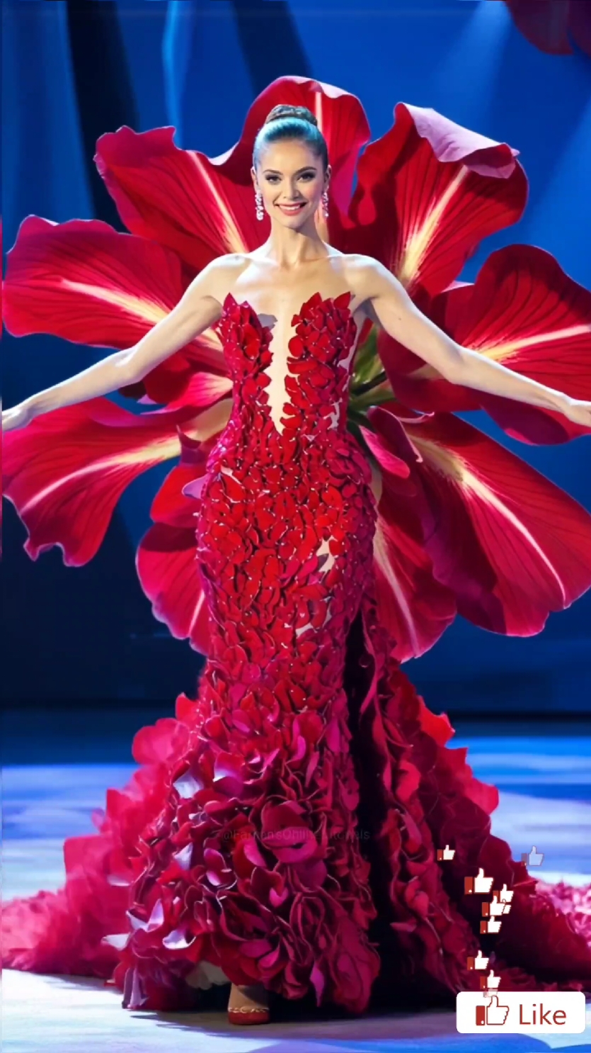 The woman performs a magic with A red flower on America got talent #agt #magic #talent #americagottelent #ai #dance #fusion #britaingottalent #bgt #Runway #foryoupage #fantasy 