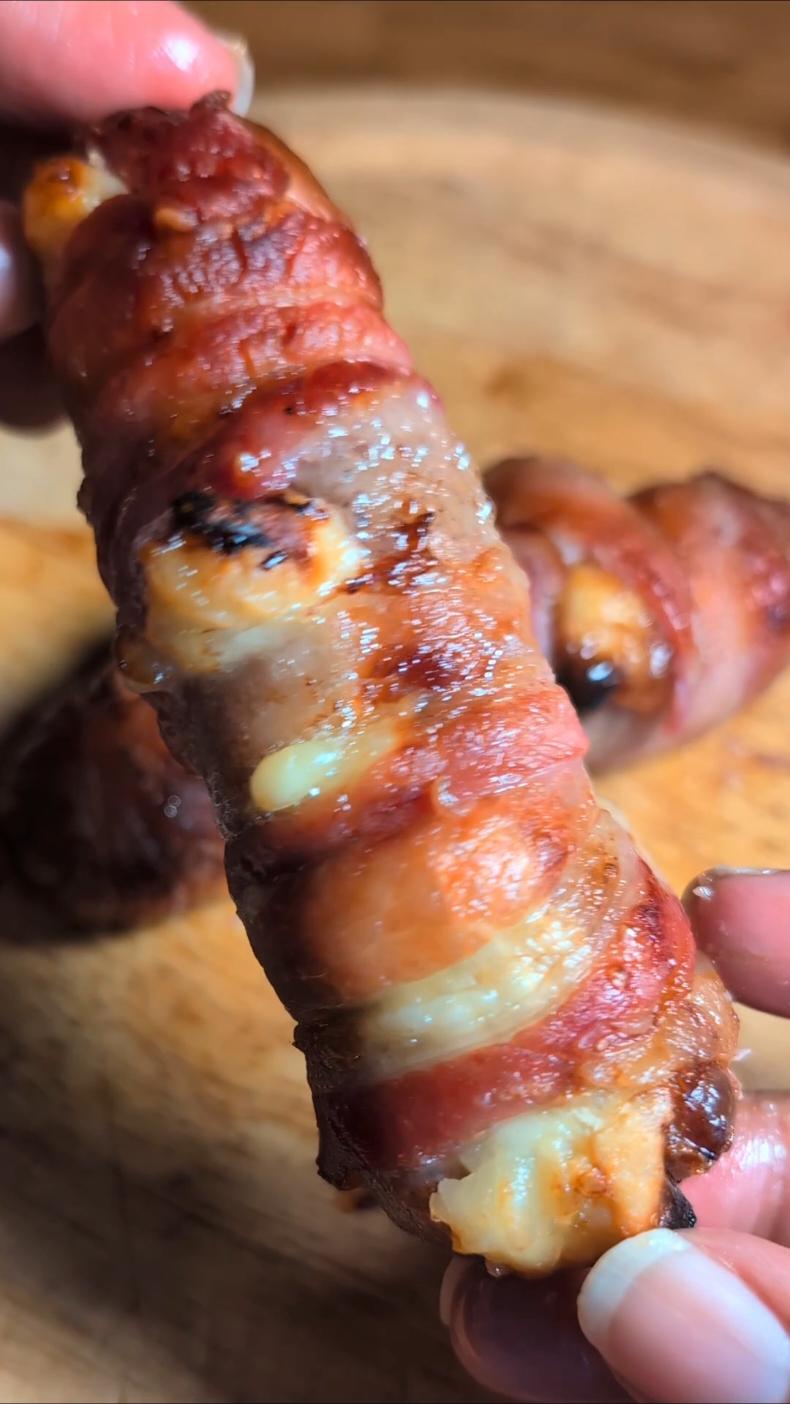 STUFFED PIGS IN BLANKETS 🧀🥓🌲 Sausages stuffed with brie and cranberry sauce, wrapped around in streaky bacon! Place them on some baking paper and pop them in the oven or air fryer, I made mine in the air fryer at 180°C for roughly 15 minutes! Tag a pigs in blankets lover! Driving home for Christmas for these? Yes please!! 🤤🎄💛 #fyp #pigsinblankets #pigsinblanket  #christmashacks #christmasrecipe #foodhack #christmasfood #xmas  #christmasrecipes #christmasmood 