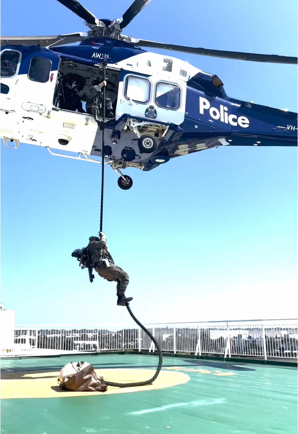 Recently the Special Operations Group conducted a high-level training exercise on the Spirit of Tasmania.  The exercise involved MICA paramedics from Ambulance Victoria and tested how both agencies would work together during a critical incident.  Local police, the Victoria Police Air Wing and Water Police Marine Response Team also took part in the exercise.  The scenario involved a multi-agency response to a mock fatal stabbing scenario, involving multiple offenders, three hours out from Geelong dock.  General duties police dispatched to the port and quickly called upon specialist police for assistance.  Soon after, the Special Operations Group was flown in by the Air Wing.  One-by-one, operators fast roped from the chopper and methodically took control of the ship.  Further operators arrived aboard rapid response speed boats with Victoria Police’s Marine Response Team, before scaling ladders to reach the unfolding incident.  SOG members meticulously resolved the incident before its specialist medics, who are part of the team, provided lifesaving clinical treatment to victims with varying injuries.  Once safe, Ambulance Victoria’s HEMS helicopter dropped off MICA paramedics, who took over coordination of the medical response until the ship arrived at the dock.  The scenario was part of the Special Operations Group extensive training program and not prompted by any threat. #victoriapolice #SOG #policing #VP #SpecialistOperationsGroup #training #FYP