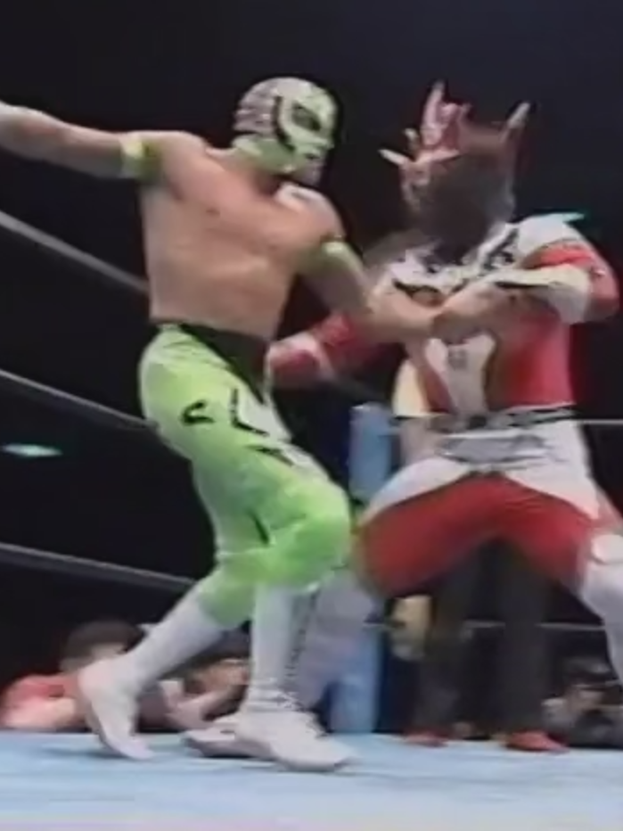 Jushin Liger with a super stiff power bomb to Rey Misterio Jr (Rey Mysterio). (WAR Revolution Anniversary FOUR Night Two July 21, 1996)