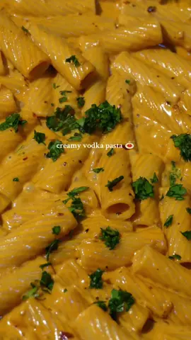 creamy vodka pasta with burrata 🍝 this pasta with silky vodka sauce and fresh burrata is one of my favorites! super quick and easy to make and its so creamy 😋 Ingredients: • Olive oil, for cooking and drizzling • 1-2 shallots, finely diced • 6 cloves garlic, minced • 2 tbsp tomato paste • 1 shot vodka • 1 tsp red pepper flakes, plus extra for garnish • 1 cup heavy cream • Black pepper, to taste • 1/2 cup Parmesan cheese, grated • Rigatoni pasta • Salt, for pasta water and seasoning • Burrata cheese, for topping Instructions: 1. Cook the Pasta: Bring a large pot of water to a boil and heavily salt it. Add the rigatoni and cook according to package instructions until al dente. Drain the pasta, reserving 1 cup of pasta water, and set aside. 2. Start the Sauce: In a large skillet or saucepan, drizzle olive oil over medium heat. Add the finely diced shallots and minced garlic, and sauté until fragrant and softened, about 3-4 minutes. 3. Add Tomato Paste & Spices: Stir in the red pepper flakes and tomato paste, cooking until the tomato paste deepens in color and the mixture is well combined, about 2-3 minutes. 4. Add the Vodka: Pour in the vodka and let it cook down, stirring to incorporate, until the alcohol has mostly evaporated and the sauce is slightly reduced. 5. Add Cream: Lower the heat slightly, pour in the heavy cream, and stir well until the sauce becomes creamy and smooth. Season with black pepper to taste. 6. Combine with Pasta: Add the cooked rigatoni to the sauce along with the grated Parmesan. Pour in a bit of the reserved pasta water and stir continuously until the sauce thickens and coats the pasta, adding more pasta water as needed until you reach a creamy, emulsified consistency. 7. Plate and Garnish: Plate the creamy vodka pasta, then top each serving with a generous portion of burrata. Drizzle the burrata with olive oil, and sprinkle with extra black pepper, salt, and red pepper flakes for a touch of heat. recipe will also be on my website 🔗 linked in bio soon! #pasta #vodka #vodkapasta #creamy #creamypasta #dinner #DinnerIdeas #Recipe #burrata 