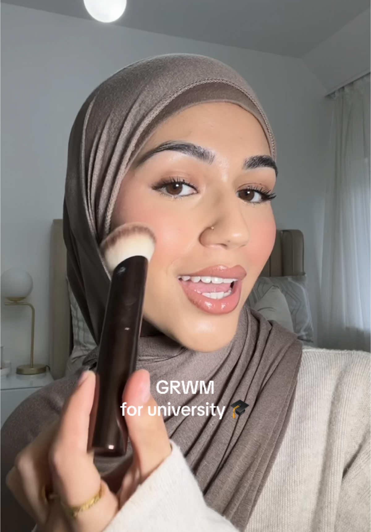 Simple everyday makeup look ✨🧕🏼• products used: @Charlotte Tilbury magic cream @Sculptedbyaimee hydra tint shade 4.5 @TooFacedUK BTW concealer shade almond @Huda Beauty blush filter shade strawberry cream @Benefit Cosmetics UK hoola bronzer @Clinique UK pink pop blush  @Kevyn Aucoin lipliner shade new naked @Fenty Beauty lip stix shade two lips kiss  @hudabeautyshop legit lashes mascara  @urban decay brow gel & all nighter setting spray
