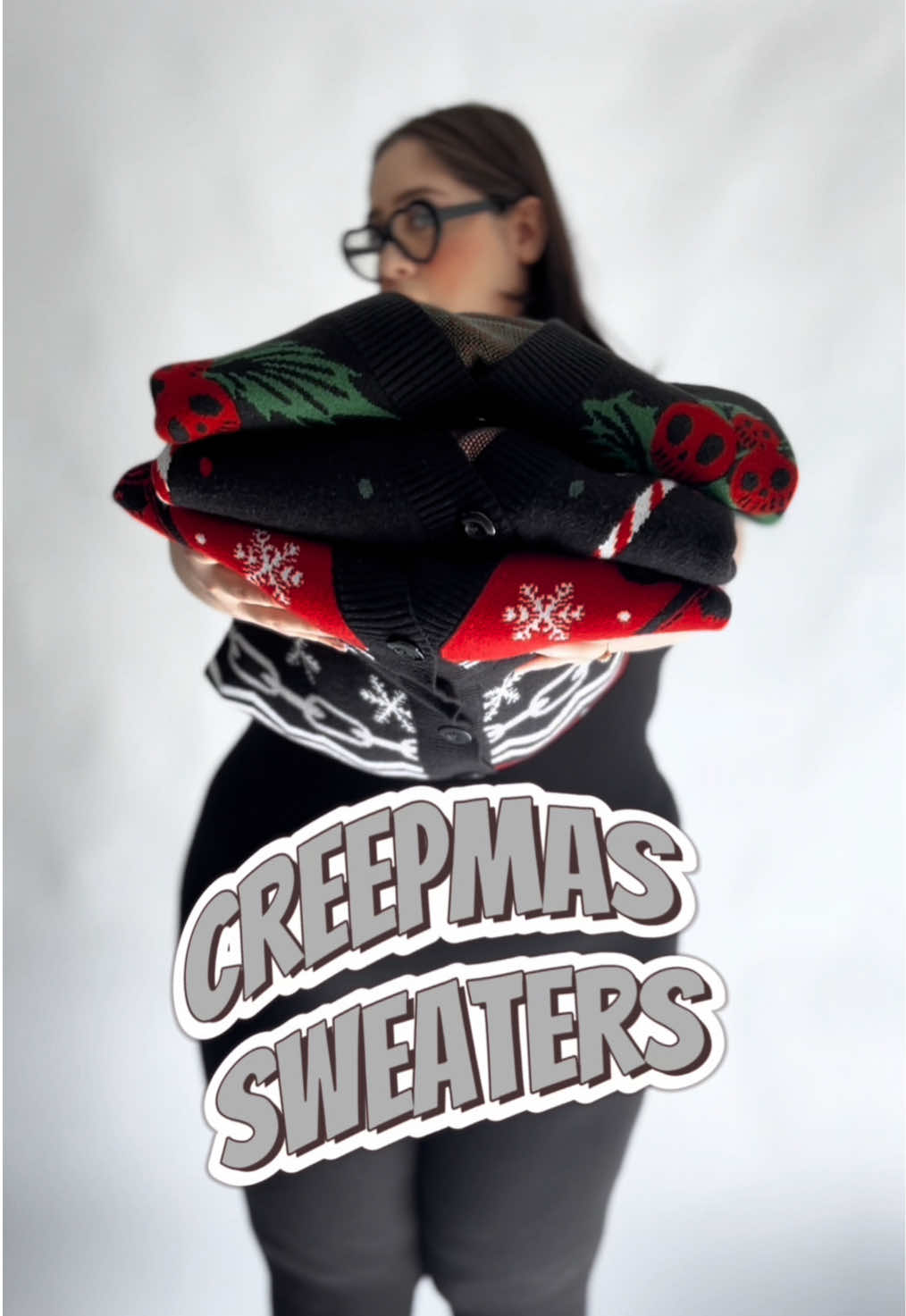 Keep spooky season alive! (Sizing info: Keilah is a size 2X-3X typically she says and is wearing the size XL/2XL in all 3 sweaters) #gothtok #gothfashion #creepmas #fallaesthetic #uglysweaters #holidayvibes #xmas #krampus #yule