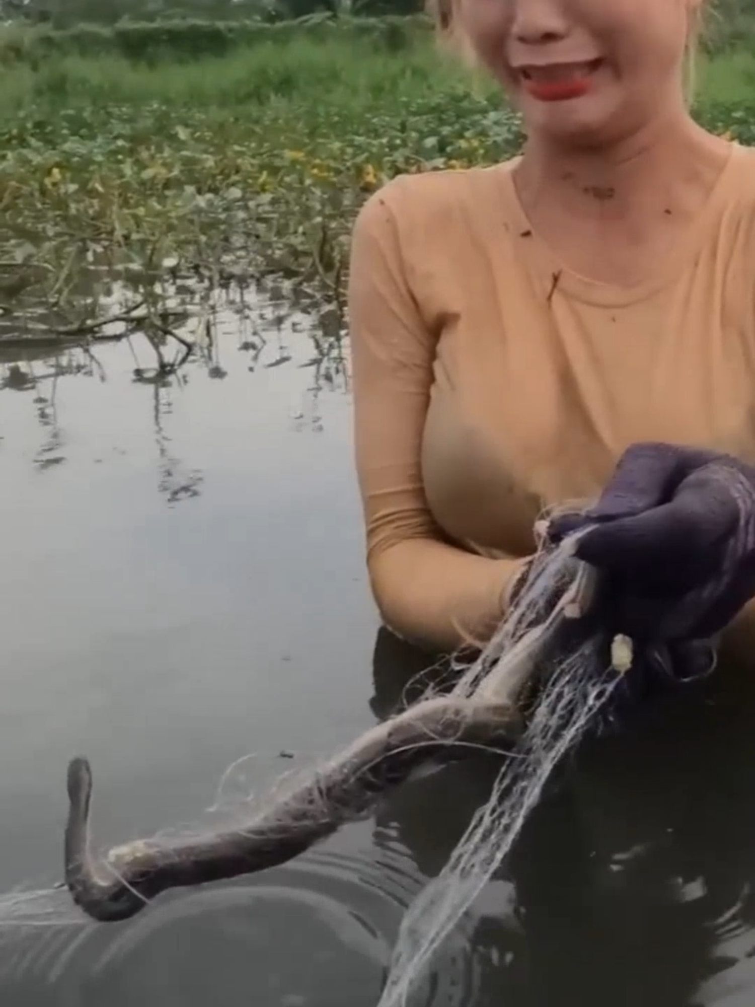 Beautiful girl catching fish #beautiful#girl#fishing#camping#survival#fyp