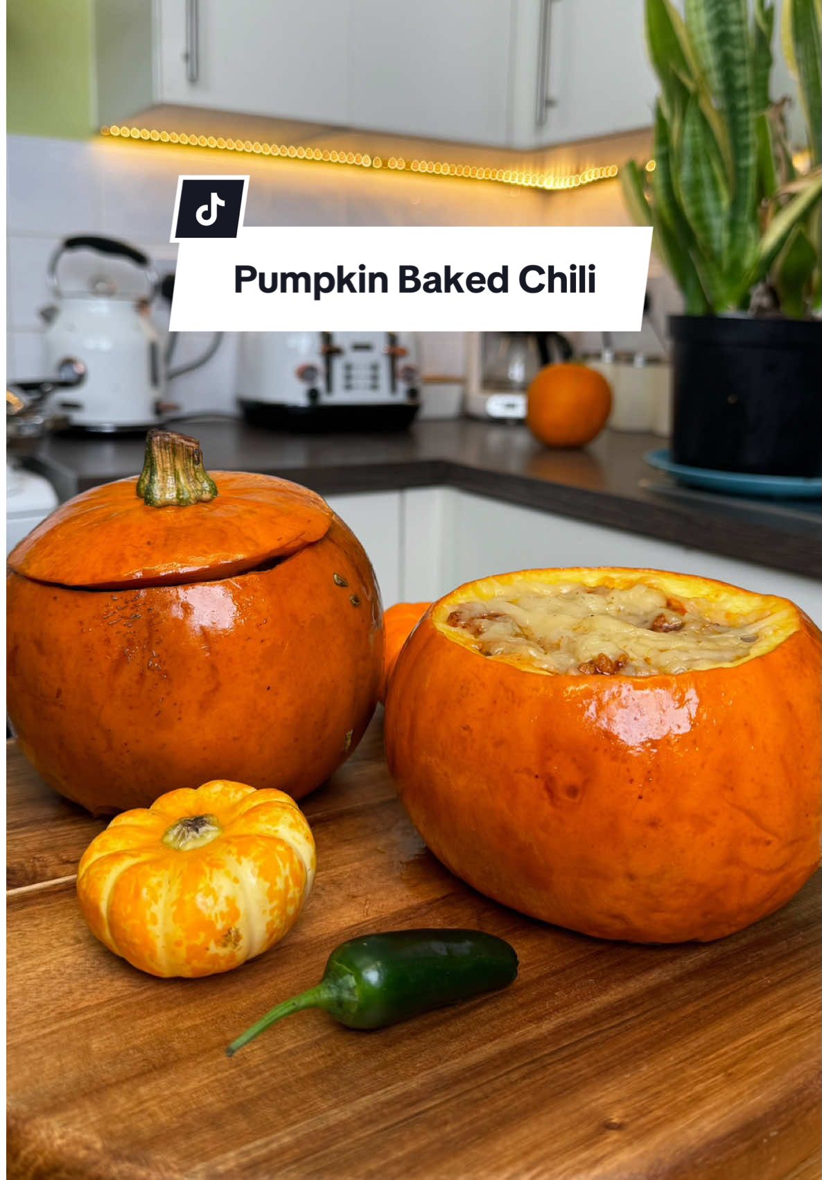 Cozy up with this hearty pumpkin-baked chili 🎃✨ Packed with protein, perfect for meal prep, and full of fall flavor! Recipe below 💛🍂 🌱  150g pea protein mince @bulk  🌱  1 can kidney beans 🌱  1 onion, diced  🌱  3 garlic cloves, minced 🌱  1/4 scotch bonnet (optional) 🌱  1 cup mixed bell peppers, diced 🌱  1/2 tbsp chilli powder 🌱  1 tbsp smoked paprika 🌱  ¼ cayenne pepper 🌱  2 tsp cumin 🌱  1 tsp onion salt/ or powder 🌱  1 tbsp oregano  🌱  1 tsp chipotle paste (optional) 🌱  2 tbsp tomato paste 🌱  1 can tomato diced 🌱  1 cup vegetable broth/stock 🌱  ½ tbsp yeast extract 🌱  Salt to taste 🌱 2-4 mini pumkins  🌱 dairy-free cheese and toppings of choice  Serves 4-6 1. Preheat oven to 190°C. 2. Rehydrate pea protein mince per package instructions and set aside. 3. Wash pumpkins, cut off tops, and remove seeds. Brush inside and out with oil, sprinkle with salt. 4. Wrap pumpkins in foil and bake for 20–25 minutes. 5. In a large pot, sauté onion until translucent. 6. Add garlic, Scotch bonnet (optional), and bell peppers; cook a few minutes. 7. Stir in pea mince, spices, and additional oil if needed. 8. Mix in tomato paste, chipotle paste (optional), and kidney beans. 9. Add yeast extract, vegetable broth, and salt. Simmer on low for 20–25 minutes. 10. Scoop the chilli into the pumpkins top with dairy-free cheese and place back into the oven for 10-15 mins. #plantbasedfood #fallflavors #comfortfood #pumpkinchili #pumpkin #pumpkinrecipes 