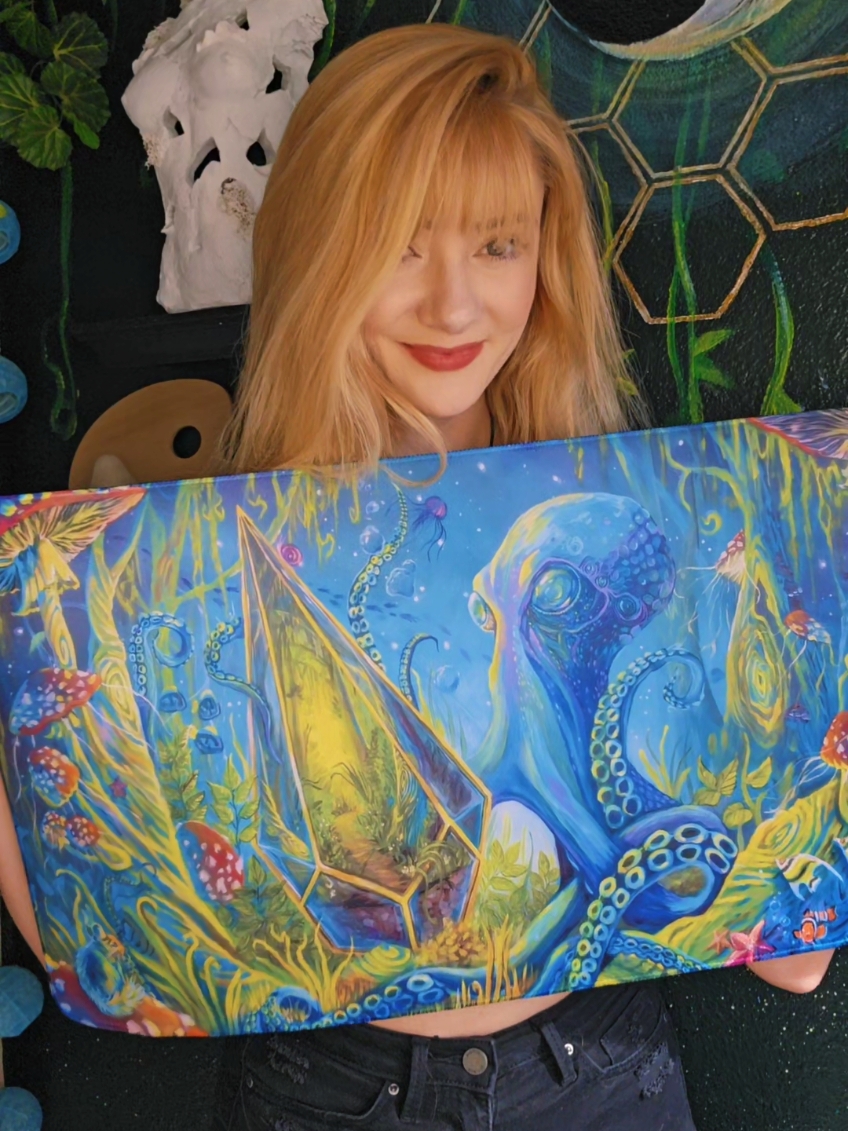 Works as a mousepad too:) 🎨🥰✨️ Thanks to all of you who reached out when I posted it on my story. I didn't realize so many people would like my art on a playmat, lol. So I got some more! 🫶  #artistvsart #playmat #gamers #mtg #octopus #gamingstation #trending #trippyart 