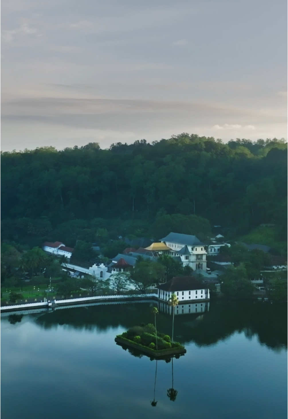 What’s your favorite thing about Kandy? The culture, the food, or the stunning views? Let us know below! 🍃🧘‍♀️ Kandy, Sri Lanka’s cultural capital, is a city rich in heritage and breathtaking scenery. Nestled among misty hills, it’s home to the sacred Temple of the Tooth Relic and the serene Kandy Lake. With its vibrant festivals, lush botanical gardens, and tea plantations nearby, Kandy offers an unforgettable experience. 📸 @amalprasad / @zonchophoto  📍 Kandy, Sri lanka 🚫Commercial Reposts Not allowed without permission  🙏 Sharing is always welcome and appreciated!  #srilanka #lka #visitsrilanka #discoverwithtiktok #Travel2024 #srilankadaily #fyp #srilankatravel #TravelDestinations #CondeNastTraveler 