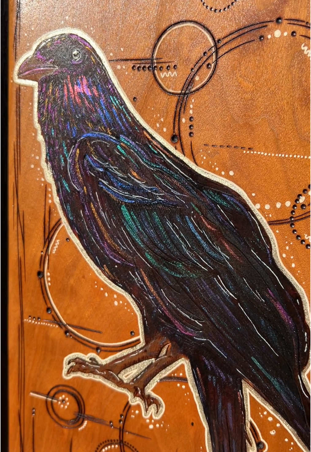 The Raven.  She’s magical. Kinda spooky, kinda ominous, kinda Edgar-Allan-Poe-y, kinda steampunkish, but 100% magic.  Inspired by a raven that flew down next to me on a trail in Arches National Park during golden hour one summer, this piece does the moment justice in every way possible.  Shes $400 and will be adoptable on Nov 22 at 11am ET for my Massive Holiday Art Drop. I sincerely hope she finds a home. She captures people’s attention and everyone loves to see her at shows, but alas no adopters.  She will bring her spooky warm magic into your home and you’re gonna absolutely love it.  Feel free to drop any questions below⬇️💚  Pyrography and watercolors on cherry wood with a cherry and ebonized oak frame. 🔥 #woodburning #makeartonwood #woodart #pyrography #itsdavidandrenee #pyrographyart #woodburningartist #mixedmediaonwood #artonwood #woodburningart #woodburnedart #archesnationalpark #arches #theraven #edgarallanpoe 