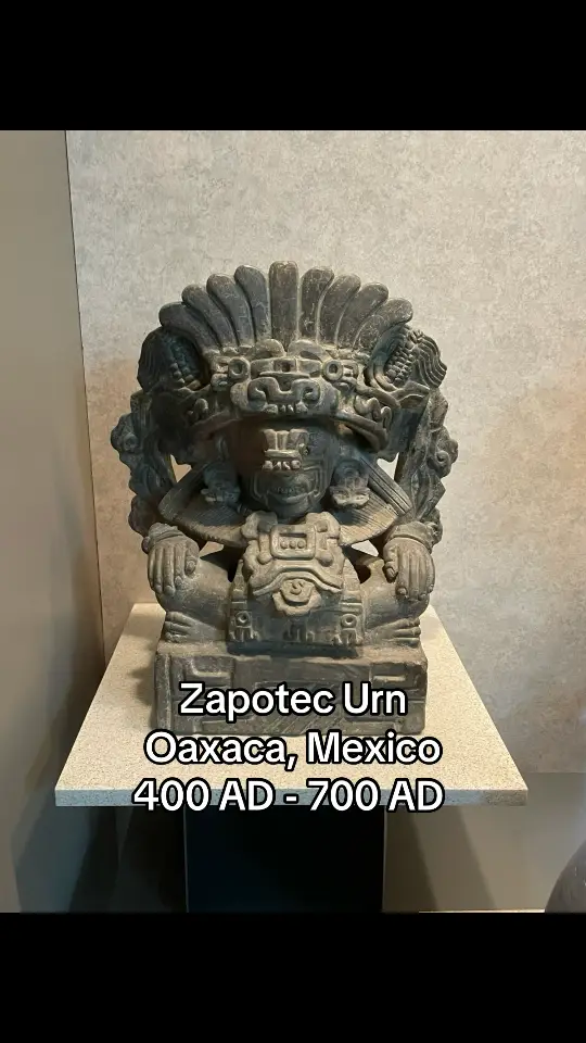 An incredible Zapotec funerary urn from Oaxaca, Mexico, circa 400 AD to 700 AD. I photographed this piece at the National Museum of Anthropology in Mexico City.  The vessel is made from the grey clay of the region and depicts Cocijo, who is the God of Rain and Thunder. He was one of the Principal Deities as rain was critically important for life and survival. Agriculture to feed the people relied on water from the rains. Interestingly, there are stalks of Maize on his complex and large headdress.  This piece was found in an important tomb and would have been placed with smaller urns to accompany it.  #precolumbian #precolumbianart #mesoamerica #ancient #ancientart #arthistory #history #archeology #zapotec #maya #aztec #mexica #mexico #mexicocity #artifact #antiquity #art #arte #arts #hispanic #latino #latina #artontiktok #arttok #artcurator  #natgeo 