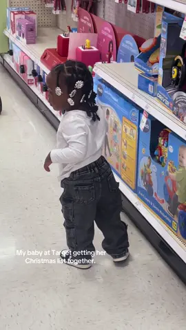 My baby at @target getting her Christmas list together. 🎄🎅🏽 #toddlersoftiktok #christmaslist #mommytok #holidayseason