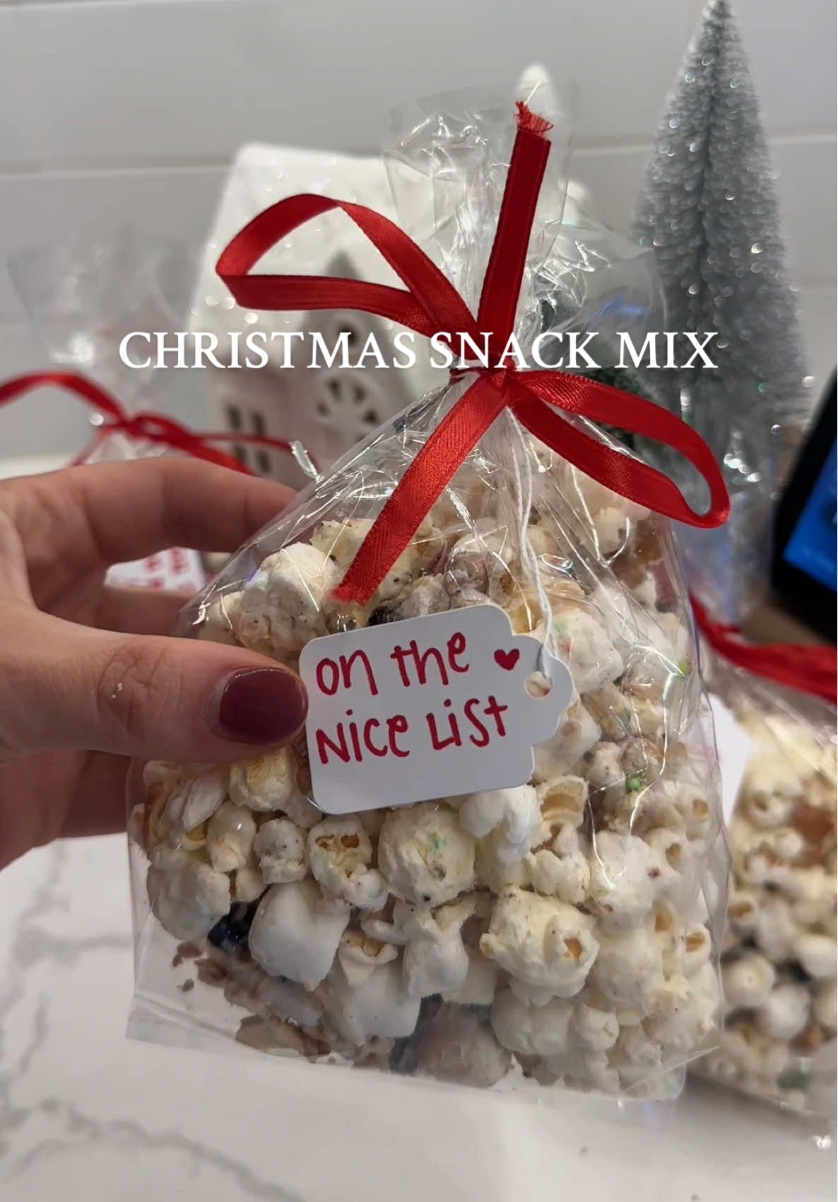 The best popcorn trail mix for christmas movie nights or to gift coworkers, neighbors, friends! Make sure to refrigerate to set the white chocolate! #christmastreats #christmasdessert #popcorn #christmasmovies #movienight #asmr #EasyRecipe #trailmix #fyp #snacks #christmas 