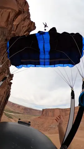 POV: Leaping into the Moab skies 🏜️🪂 Sharing the thrill of BASE jumping in Moab from my perspective! There’s nothing like the rush of freefalling alongside a friend, surrounded by epic desert views. The adrenaline is unmatched. Would you ever try this?