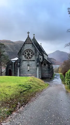 St. Mary & St. Finnan stands in a raised location in Glenfinnan, with impressive views down Loch Shiel. It was built between 1870 and 1872 and designed by Edward Welby Pugin in the Gothic style. Father Donald MacDonald decided that his parish needed a place of worship whose grandeur could match that of its surroundings. The church is also a memorial chapel to the MacDonalds of Glenaladale, the family with whom Bonnie Prince Charlie stayed prior to the raising of the Jacobite standard at Glenfinnan in August 1745. This marked the beginning of a Jacobite rising which came very close to placing the Stuarts back on the thrones of Scotland, England and Ireland. #Scotland #mood #fyp #church #gothic #architecture #history #mountain #scottish #rain #moody #beautifuldestinations #storm #braveheart #scottishtiktok #explore #scottishhighlands #travel #bucketlist #hiddengems 