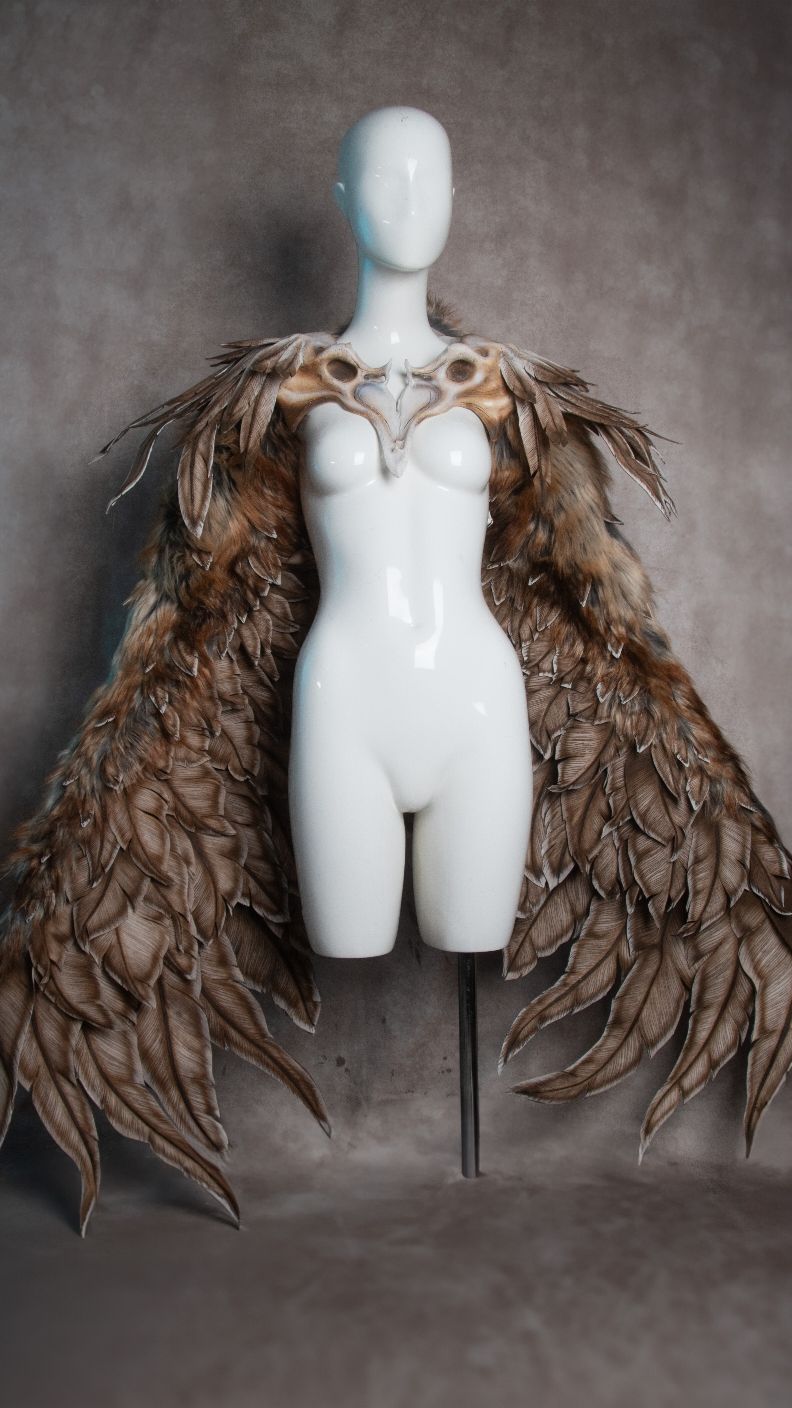 𝐇𝐚𝐫𝐩𝐲 𝐜𝐨𝐬𝐭𝐮𝐦𝐞 𝐩𝐭. 𝟑 | 𝐓𝐡𝐞 𝐰𝐢𝐧𝐠𝐬 🦅   Here they are, the most time consuming, tedious part of the costume; the wings.  Every feather (and there are hundreds) is hand cut and painted. I was definitely questioning my choices at this point🥲   #harpy  #costume  #mythical l #wings  #creature  #fantasy  #explore 