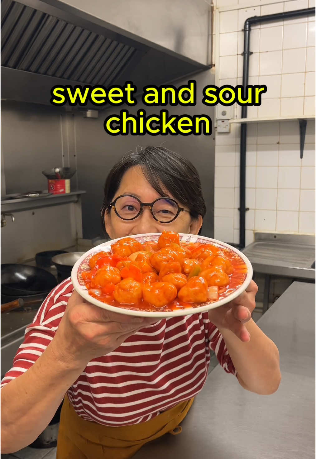 Sweet and sour chicken has to be the nation’s most LOVED Chinese takeaway dish!!! Recipe is below as always 🫰🏼😘 📍Wok Inn, Sheffield (S12 3DZ) Serves 2/3 For the chicken: 2 chicken breasts 1/4 tsp ground white pepper 1/2 tsp salt + MSG 1 tbsp shaoxing wine 1 tsp sesame oil 1 egg 2 tbsp self-raising flour 250g corn starch For the veg: 1 onion 1/2 red pepper + green pepper 3 pineapple rings 1/3 carrot   For the sweet and sour sauce: 5 tbsp sugar 4 tbsp orange squash 3 tbsp lemon & lime squash 200ml pineapple juice 2 tbsp rice wine vinegar 5 tbsp tomato ketchup 1/4 tsp red colouring (optional) 120ml water  1 tbsp cornstarch  1 litre vegetable oil  Slice your chicken into small cubes and add to a bowl. Add the seasonings and give it a good mix.  Add flour to the marinated chicken and mix well.  Add the cornstarch to a separate bowl then add the marinated chicken to the mix, toss through and set aside (this step is key to make sure all of the pork is coated well). Chop your onion, peppers and pineapple rings into 3cm pieces. Slice your carrot into 1/2 cm pieces.  Add the seasonings for the sweet and sour sauce to a bowl and stir well. Season your wok with oil on medium-high heat by pouring a ladle of veg oil into the wok, swirl around then pour away and set aside for the next step. Deep fry the chicken in two batches to ensure even cooking. Add 1 litre oil to the wok on medium heat, when the temperature is 180°C, add the chicken and fry for 2 mins. Turn the heat to high and fry for 2 mins then turn to low and fry for another 1 min. Once golden and crispy, remove the chicken from the oil and set aside on paper towels to soak up the excess oil. Repeat again for the remaining batch of chicken, double fry using the same method as this technique ensures crispy but tender chicken.  Pour 2 tbsp of oil into a clean wok then add the onion, pepper and pineapple rings, fry for 2 mins on medium heat.  Pour in your prepped sauce, stir well and cook for 2 mins. Add in the fried chicken, give it a good toss and enjoy with a portion of egg fried rice (recipe for fried rice is on my reels).  #sweetandsourchicken #chinesetakeaway 