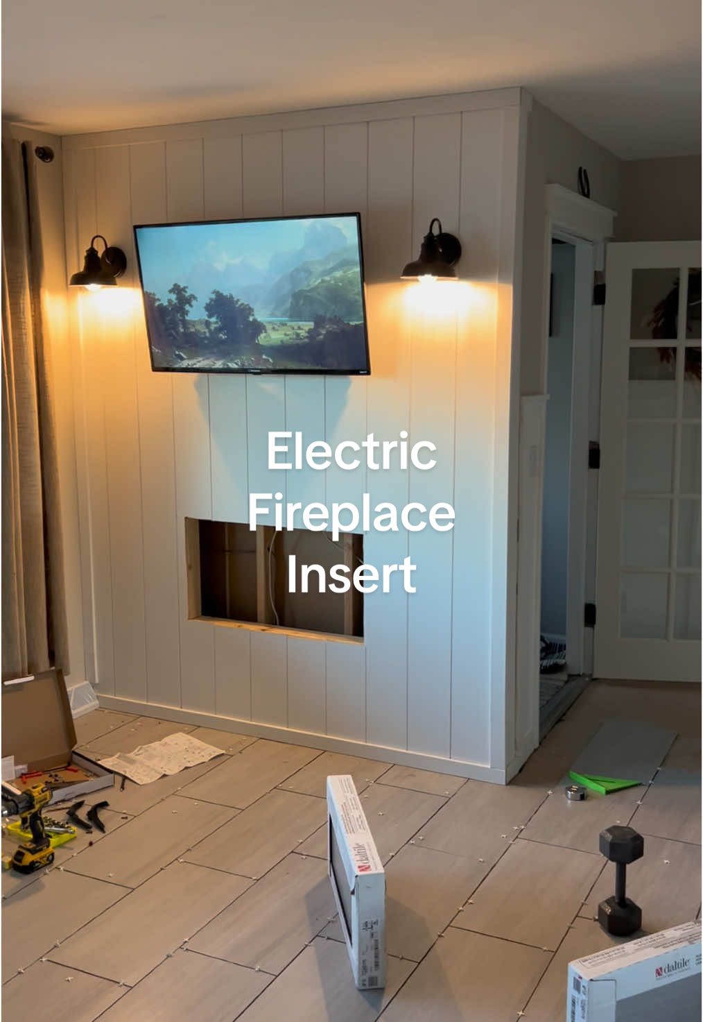 The wall is looking like something now! #storytime #house #Home #livingroom #kitchen #remodel #renovation #entryway #sconce #electricfireplace #tvwall #interiordesign #DIY #agreeablegray #small #layout  #tile #farmhouse #aesthetic 