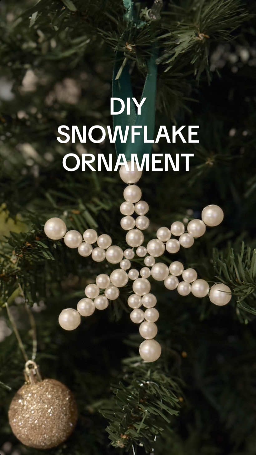 DIY snowflake ornaments! These handmade ornaments turned out so cute, lmk if you’d like a detailed tutorial ❄️  You’ll need: - Beads! I used a pack of pearl beads that came in 4 different sizes - wire, thin wire to weave the beads theough as string won’t hold the structure of the ornament - ribbon 🎀  - ✂️  #diyornaments #diychristmasornament #christmascrafts #diychristmasdecor 