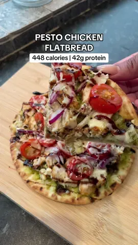 Quick easy lunch idea!  Ingredients:  * Flatbread  * 15g pesto * 5g balsamic glaze  * 10g light cheese * 120g chicken breast (raw weight) * 20g red onion  * 50g cherry tomatoes  Method:  1. Season & cook the chicken breast, 180 degrees Celsius for 15-20 mins. Cut into small pieces once cooked. 2. Spread the pesto on the flatbread. 3. Add the toppings & cheese.  4. Cook in the oven for 10 minutes, 200 degrees Celsius.  #fatlossmeals #quickrecipes #quicklunchideas #caloriedeficitmeals #lowcalorie #highproteinmeals @Deli Kitchen @M&S Food 