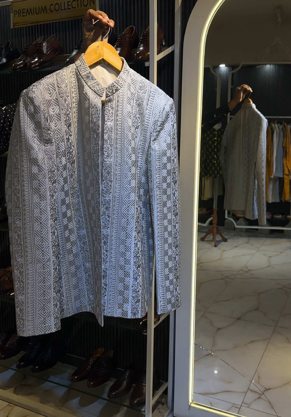 Check out our al new and latest resham embroidered prince coat in ash white color. Order us online or visit our Mm alam road store for more!